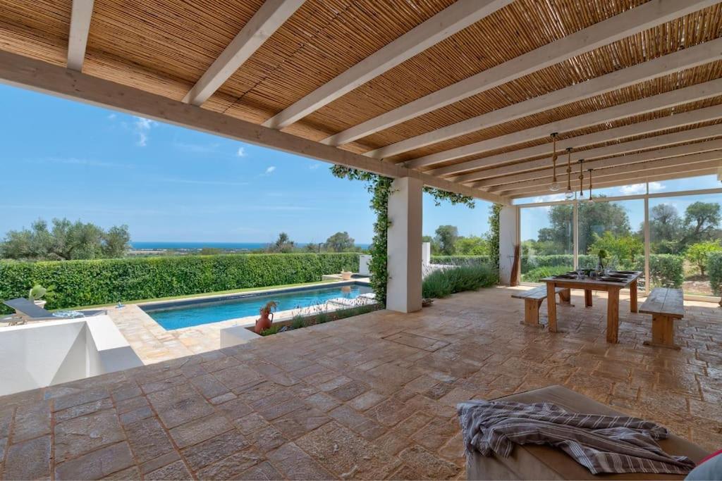 Stunning luxury villa with trullo and sea view photo 4