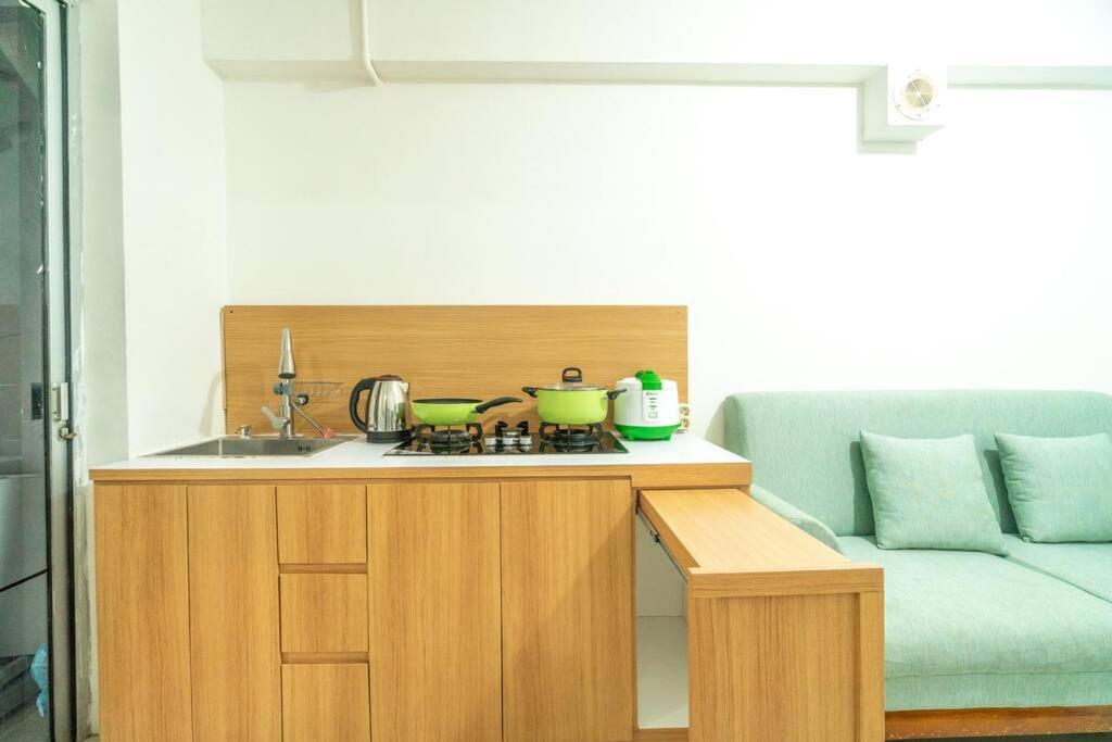Simple 2 bedroom above mall bassura Netflix view 5