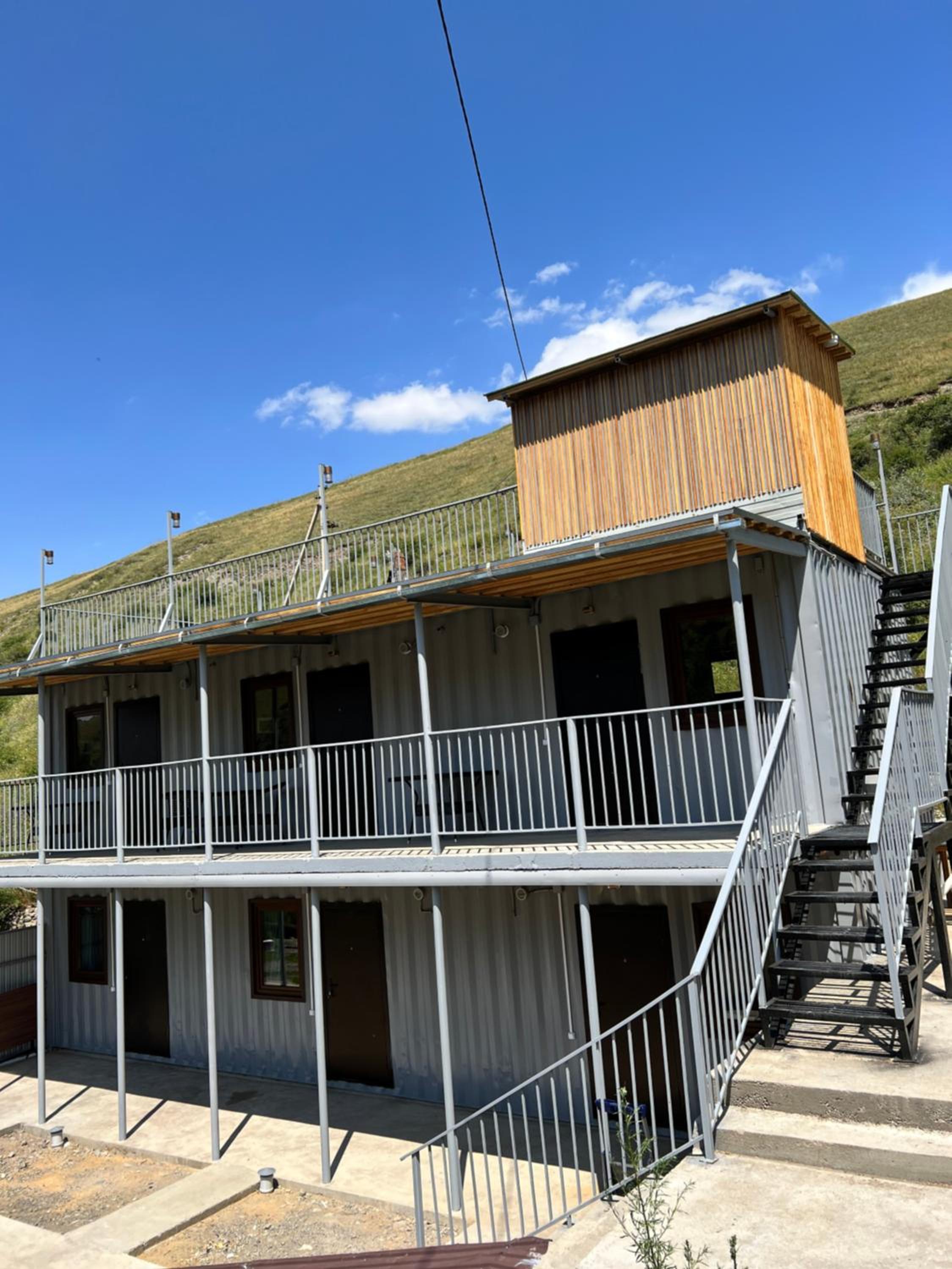 Kolsay Tanbalytas Wood panel house view 5