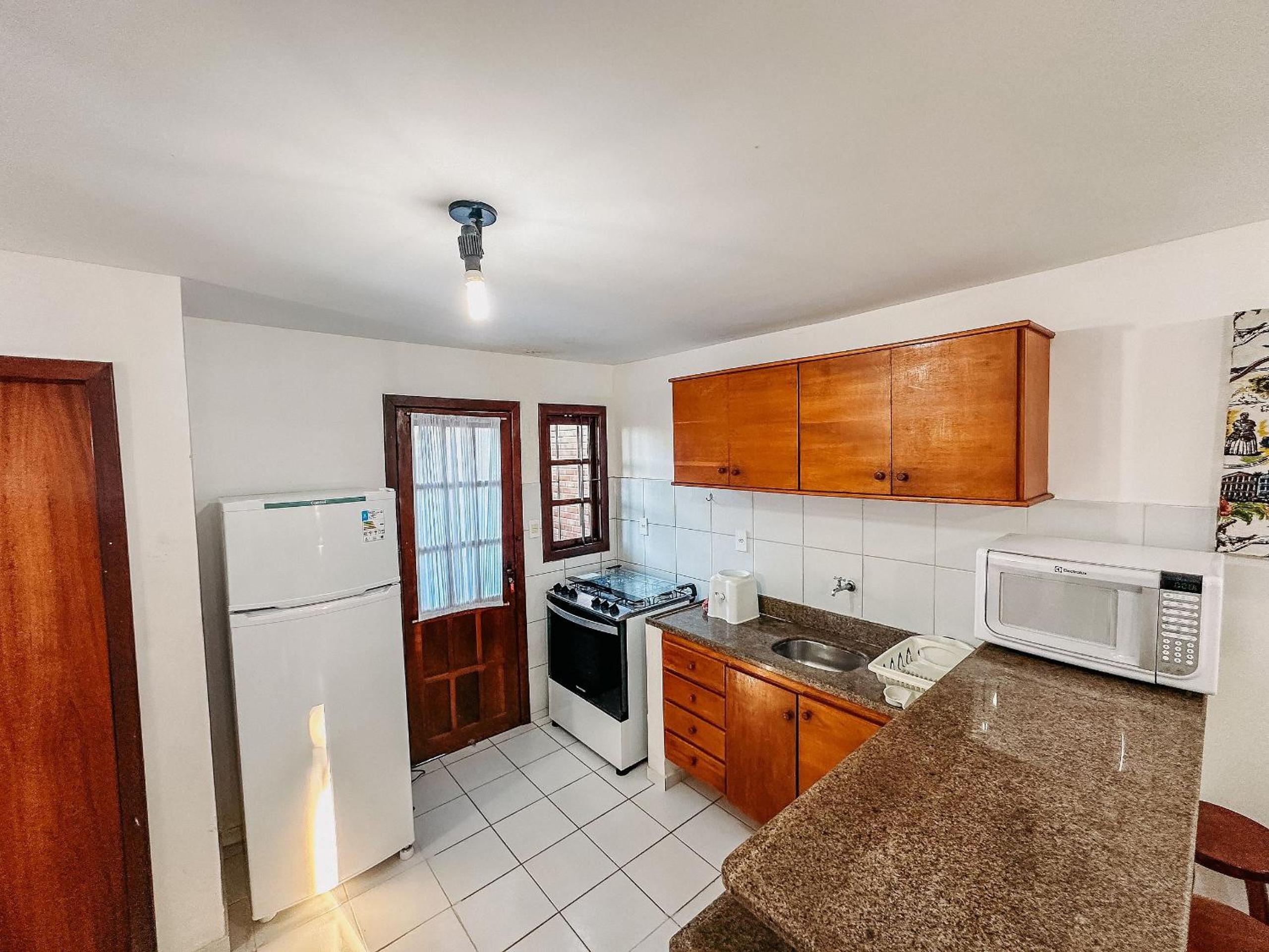 Casas no Residencial Mont Sinai com 2 ou 3 suítes (todas com ar), internet privativa 300MBPS a aproximadamento 250m da Praia de Taperapuã, condomínio com p