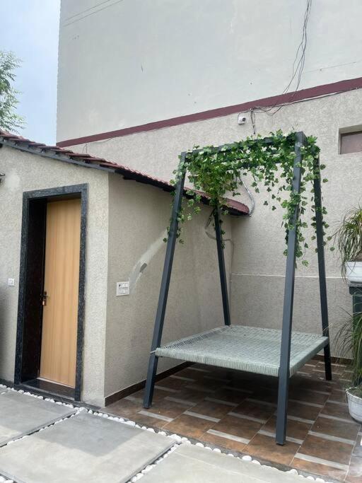 Saiba OutHouse- 4 Bed room- Pool- Theatre- PartyHall- Garden & Terrace sitting area view 5