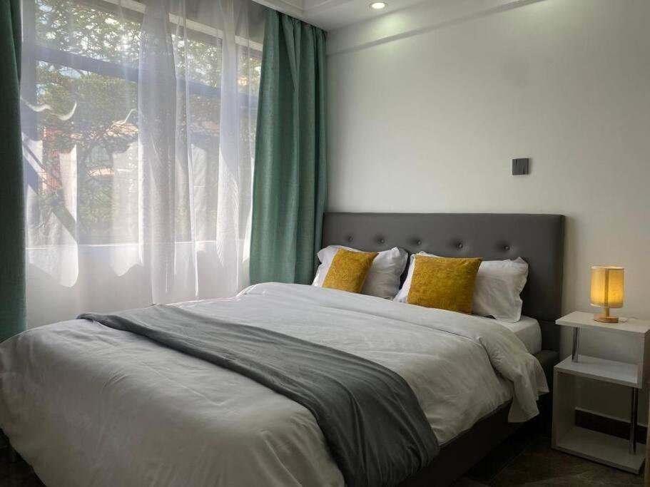 Cosy apartment in Kilimani w free parking & gym view 5