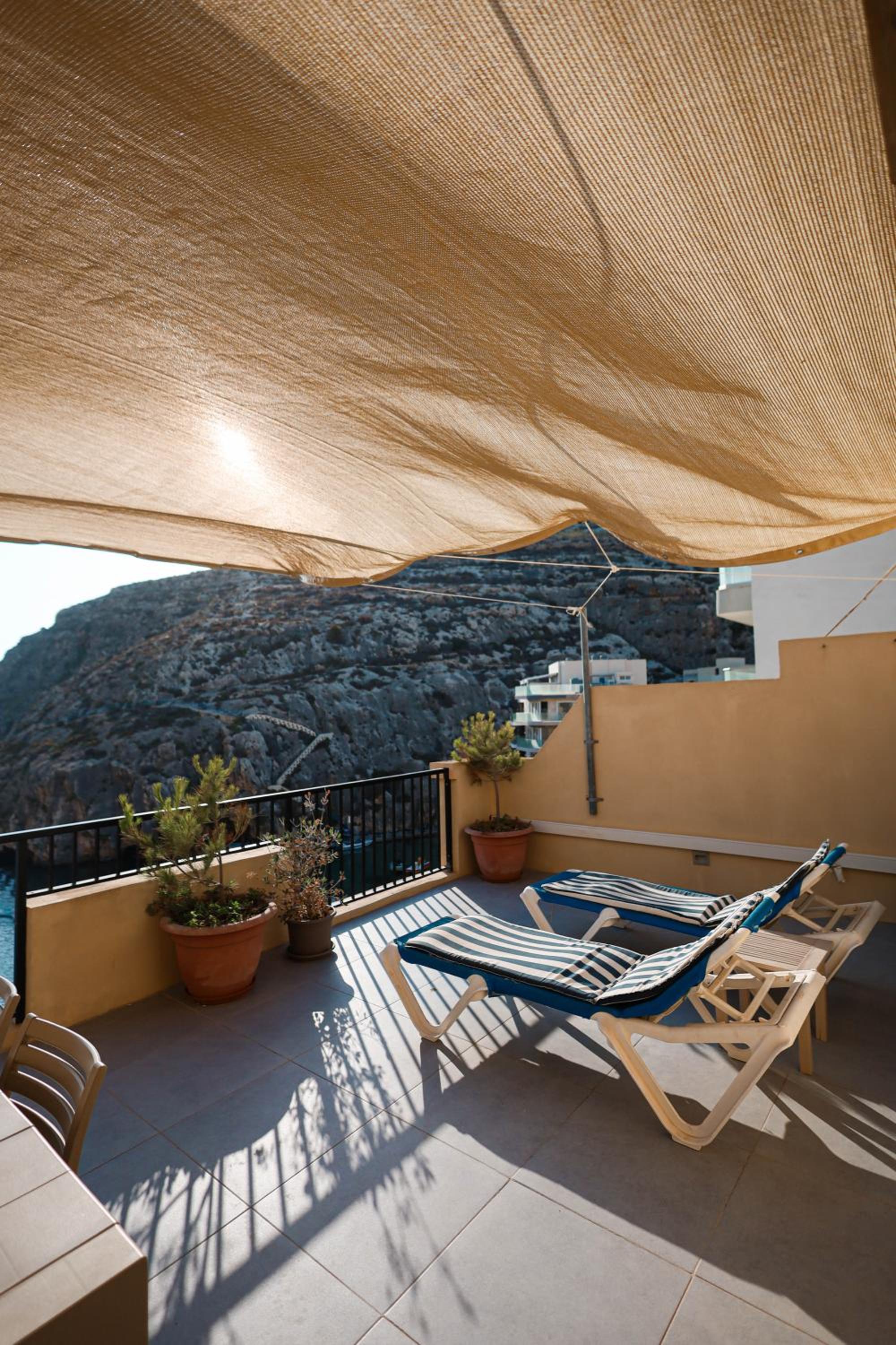 Seafront duplex Penthouse with Terrace overlooking Xlendi Bay view 2