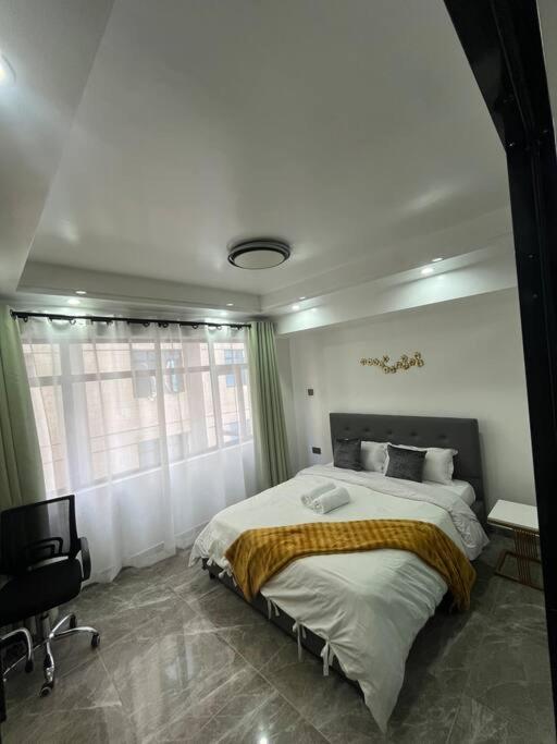 Kilimani 1BR, free parking &gym view 5