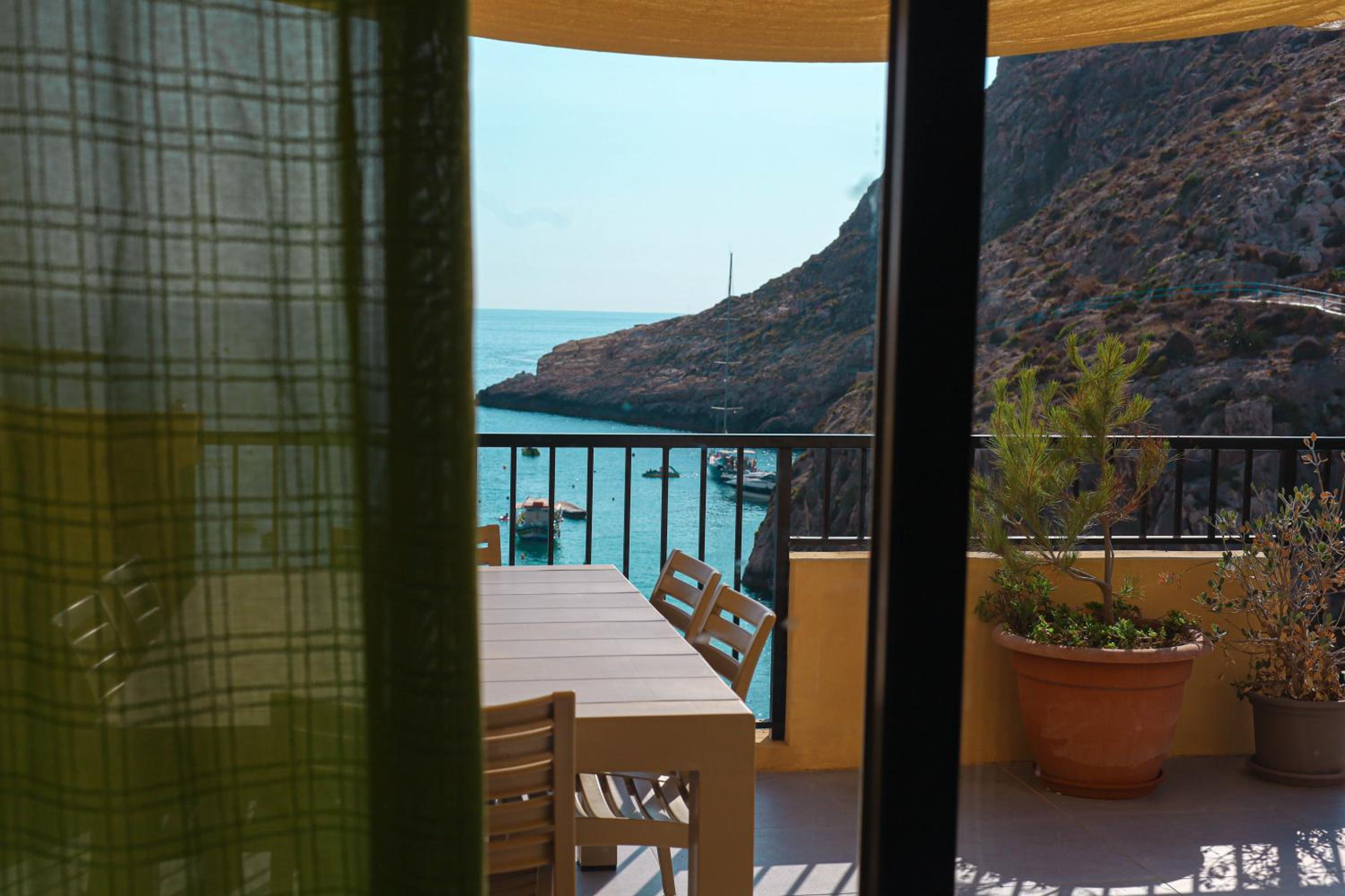 Seafront duplex Penthouse with Terrace overlooking Xlendi Bay view 4