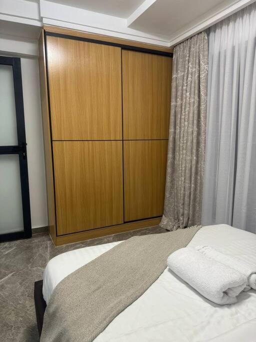 Kilimani condo, free parking&gym