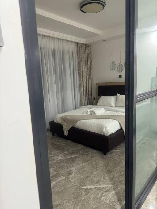 Kilimani condo, free parking&gym