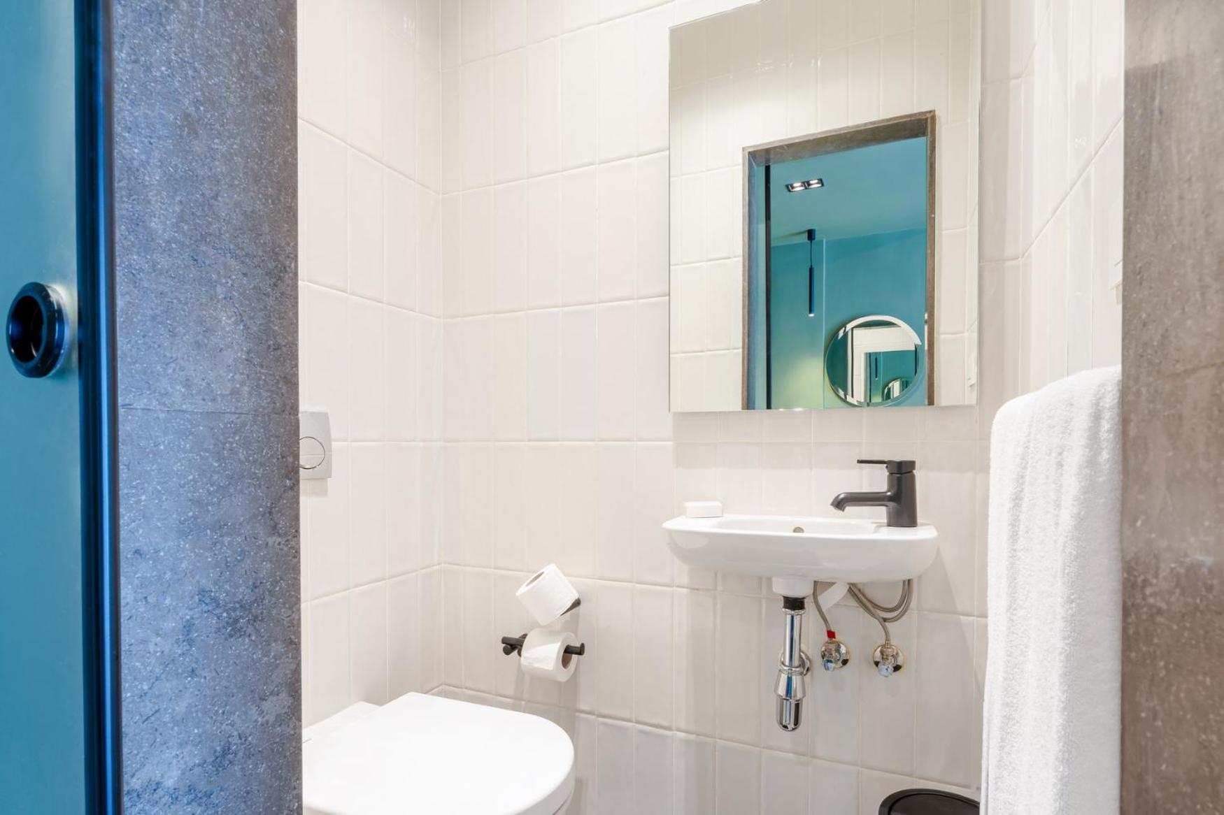 grey l studio apartments Downtown Cairo Ouzonian House