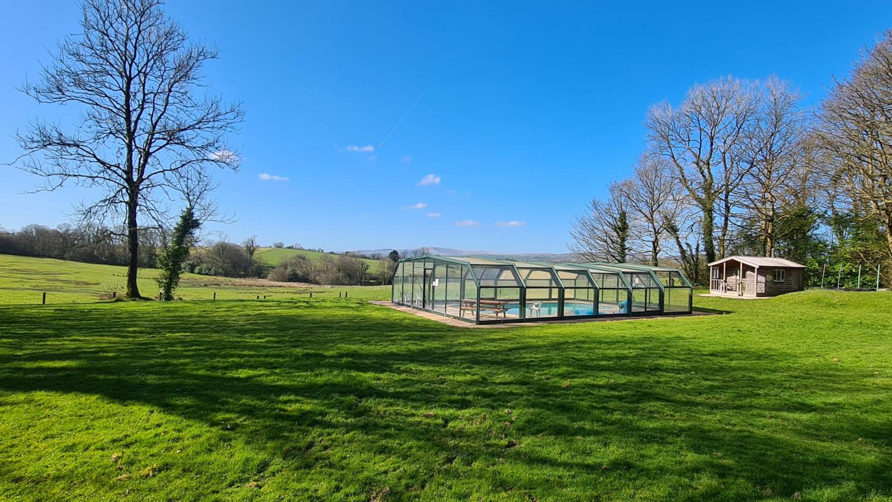 Robin Cottage Sleeps 2 Dog Friendly cottage 40 acres of grounds and woodlands Fishing Lake Swimming Pool view 3