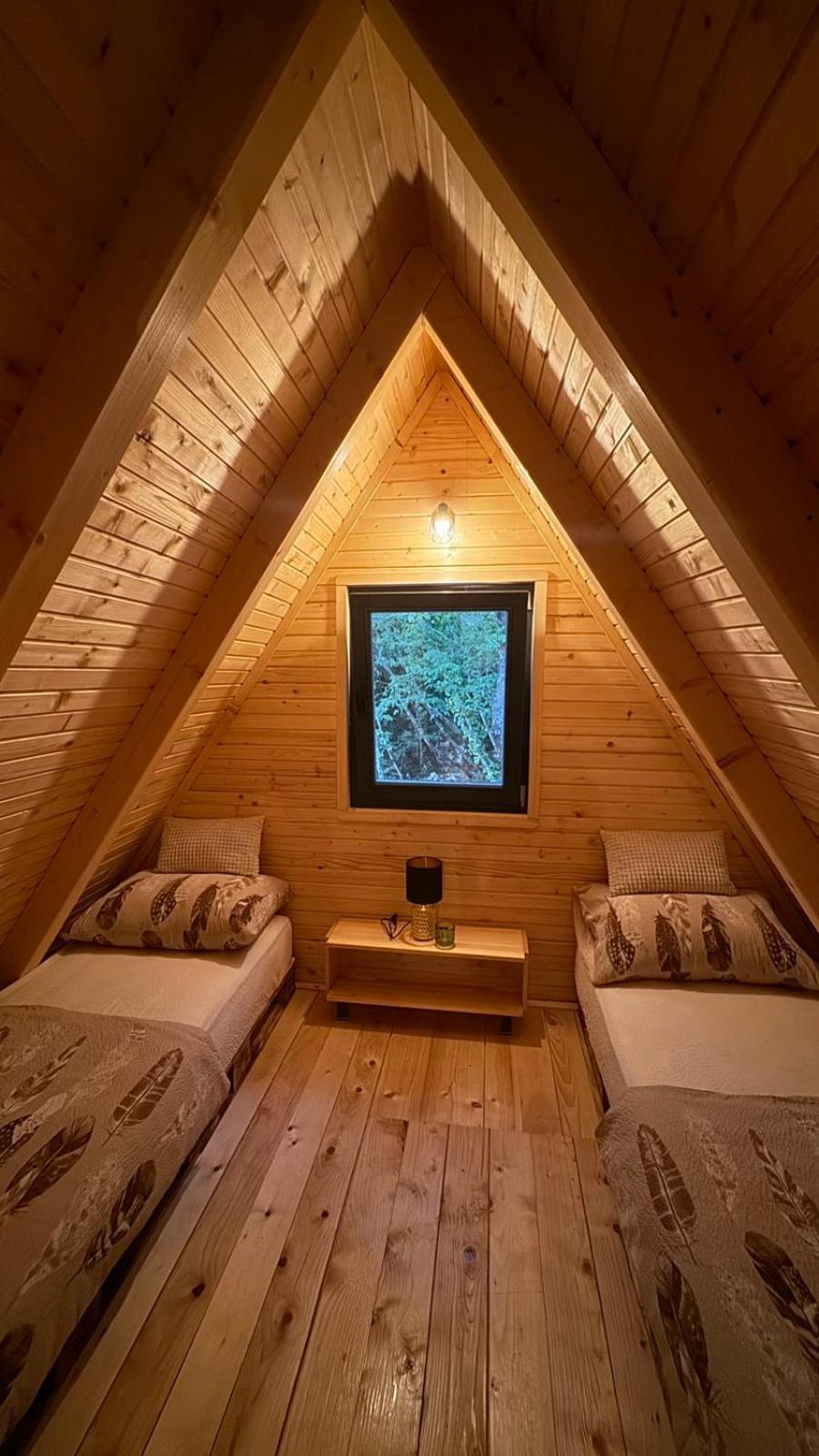 Woodland paradise Charming wooden houses in stone