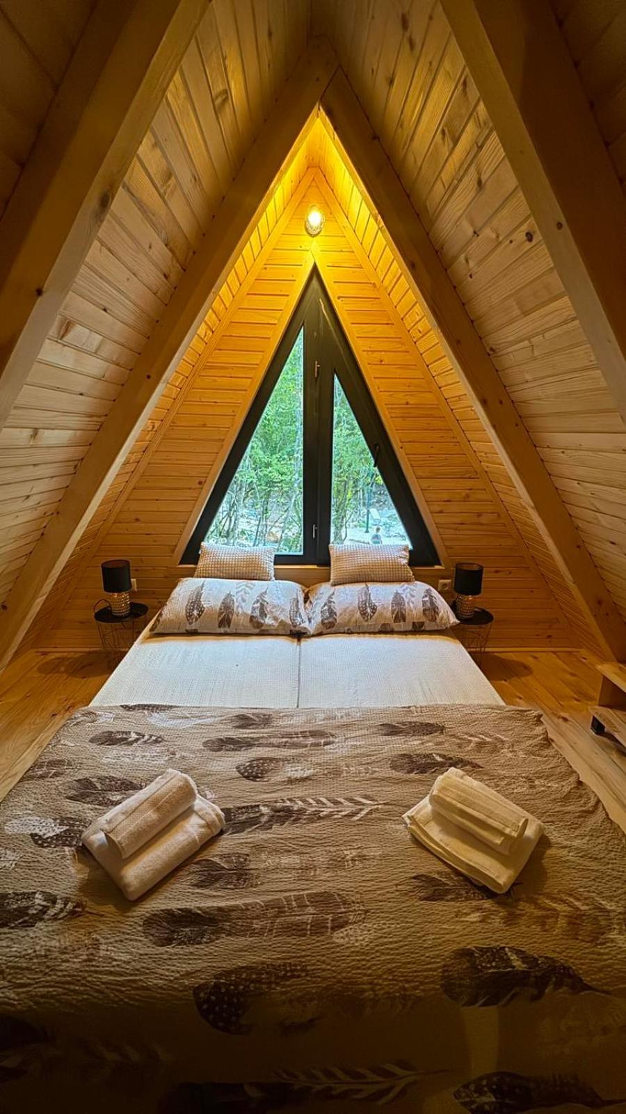 Woodland paradise Charming wooden houses in stone