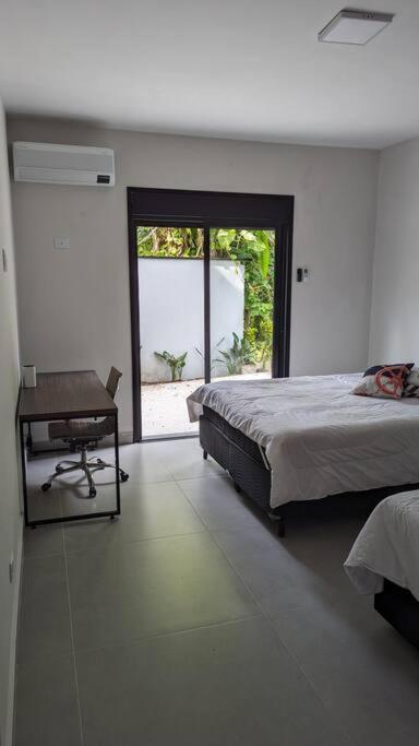 50m praia Cond pé na areia Alto padrao 4 suites Segur 24h Costa do sol Guaratuba Bertioga prox Riviera
