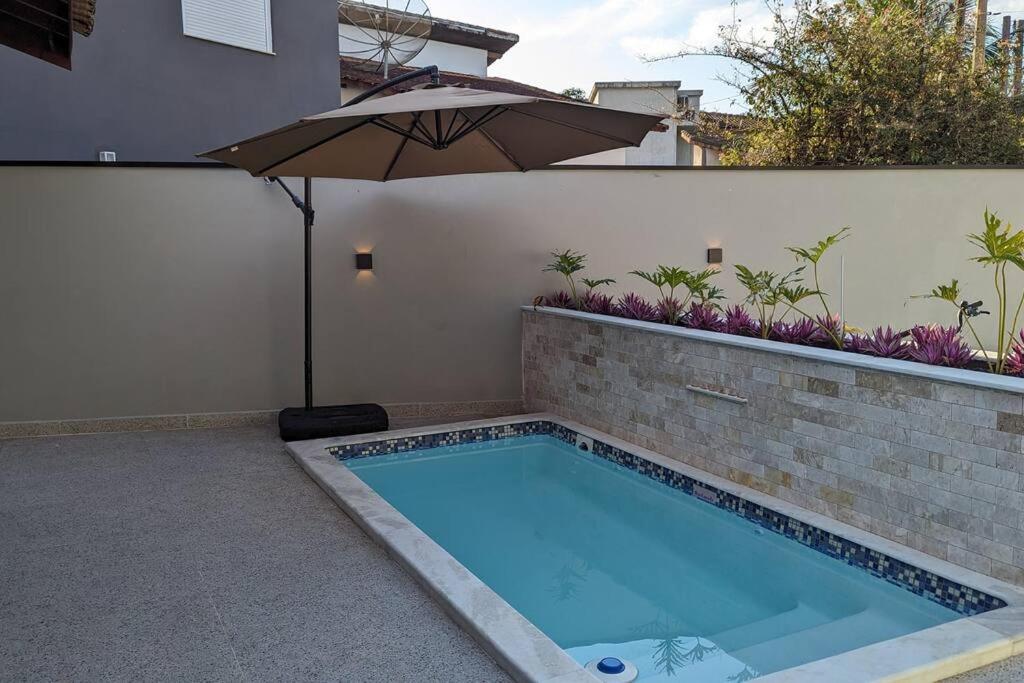 50m praia Cond pé na areia Alto padrao 4 suites Segur 24h Costa do sol Guaratuba Bertioga prox Riviera