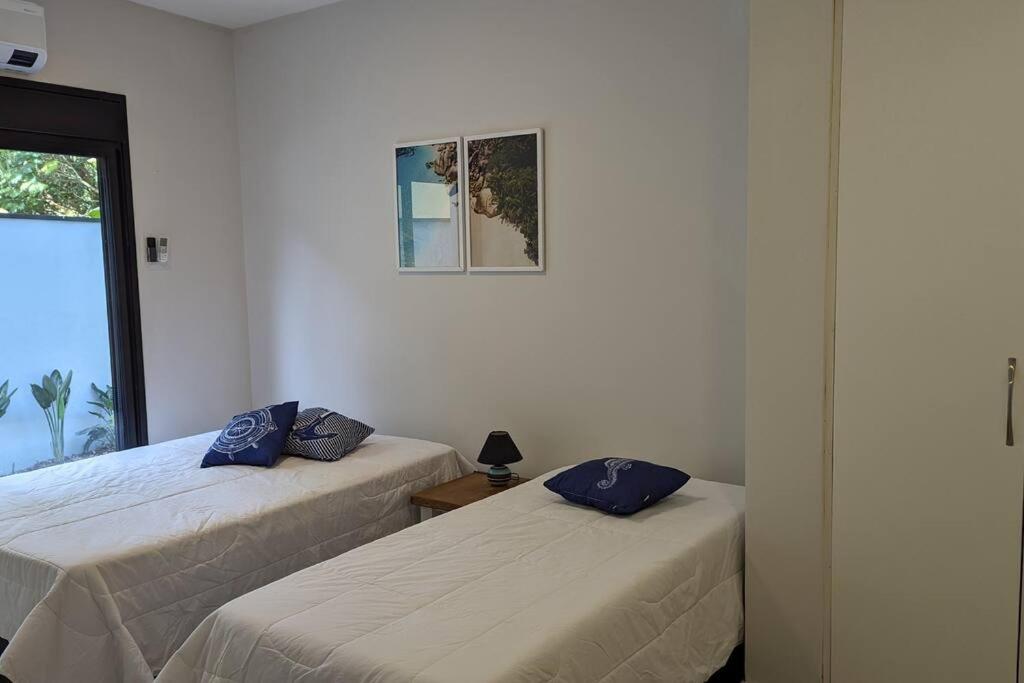 50m praia Cond pé na areia Alto padrao 4 suites Segur 24h Costa do sol Guaratuba Bertioga prox Riviera