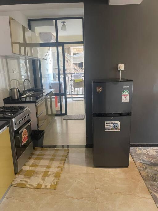 2 Bedroom ensuite Kilimani, a cozy luxury living view 5