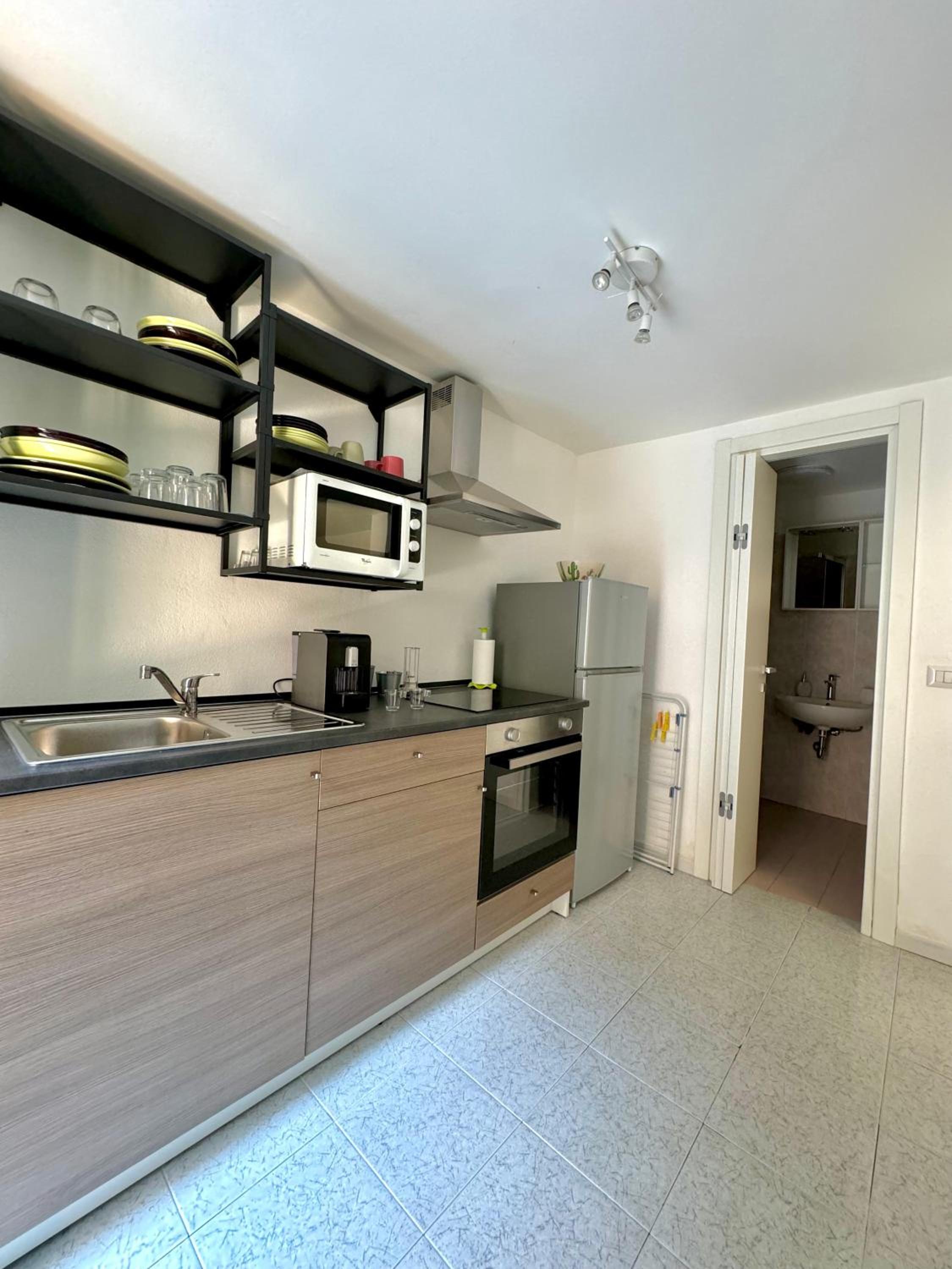 Dietro il castello en Aci Castello — kitchen