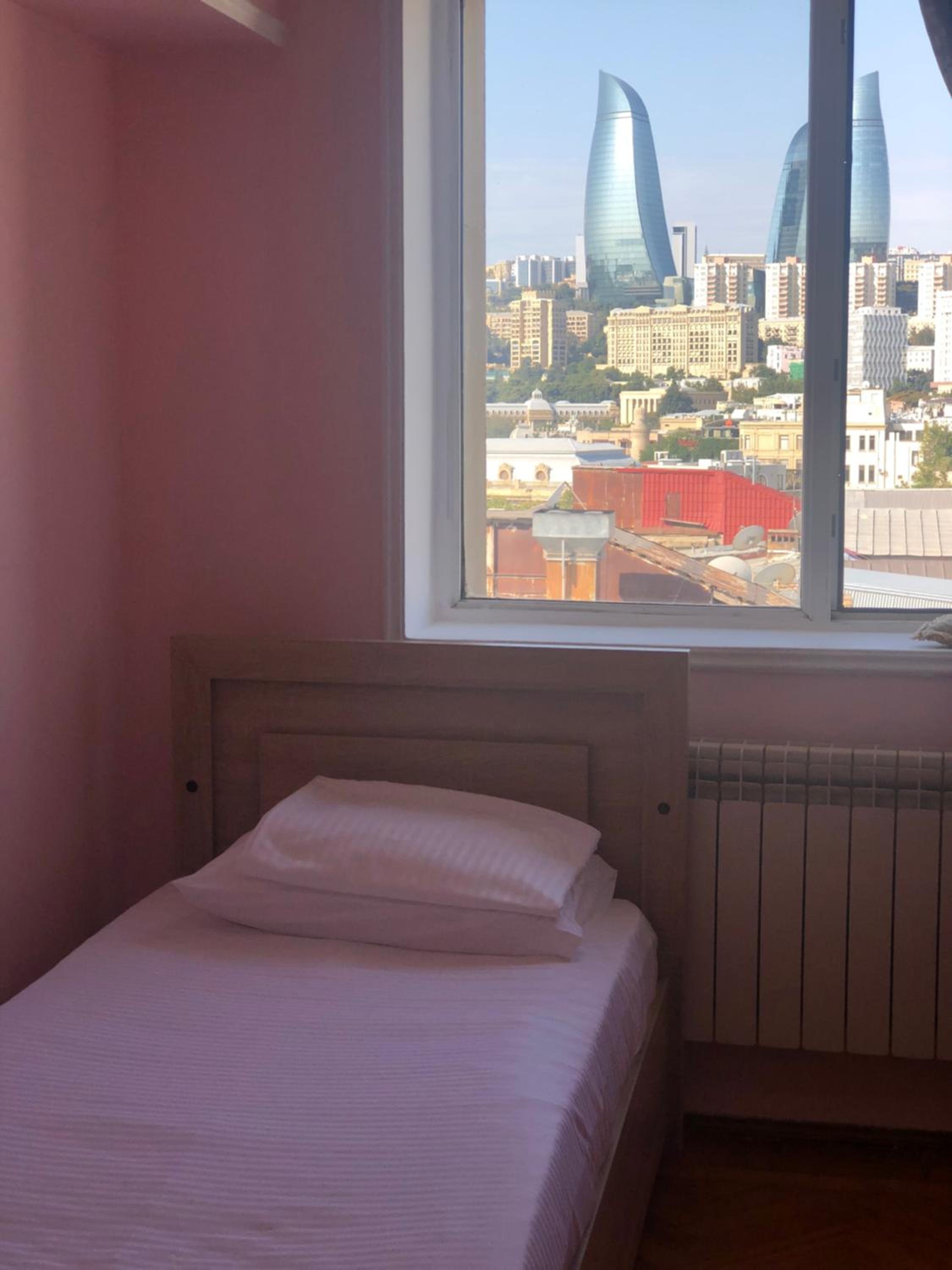 Two-room shared apartment with sea view in the city center