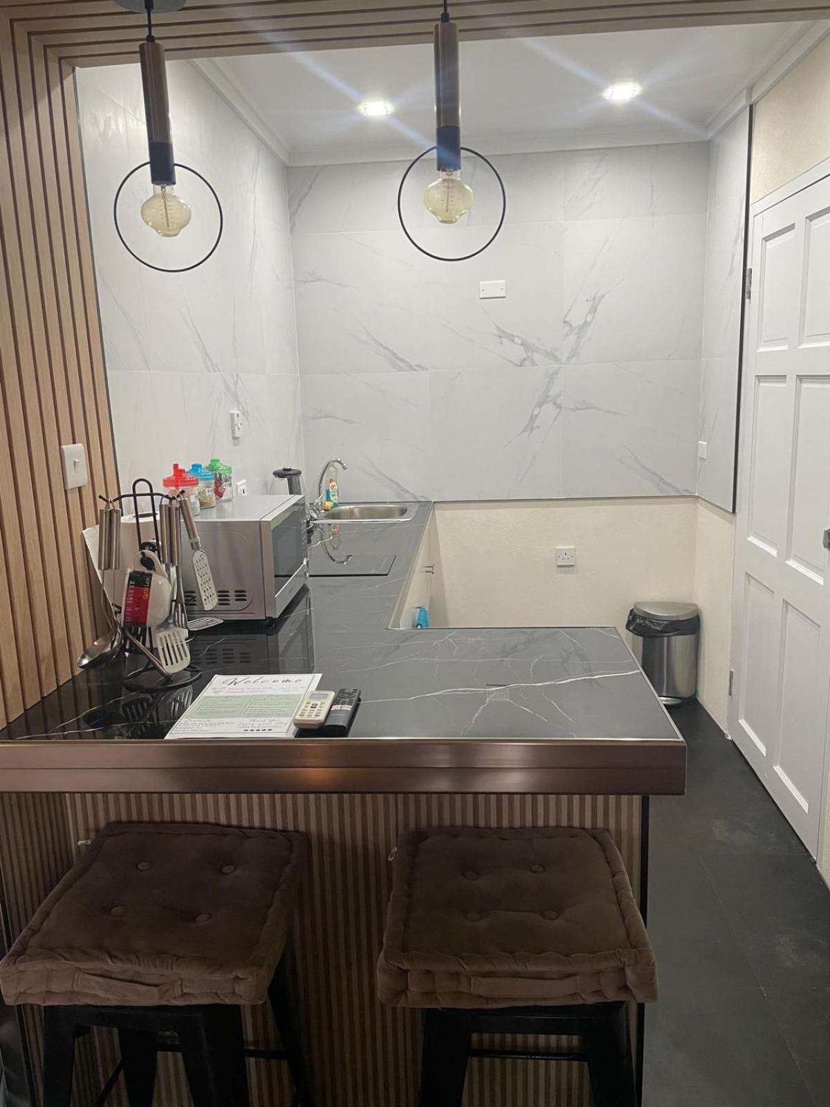 Scarlett Studios 1-US EMBASSY & America Uni 7 Mins Drive- Lloyd Erskine Centre & Ross Uni 5 Mins Drive - Holidays-The 1 Night Res Inc AIRPORT & EMBASSY Rou