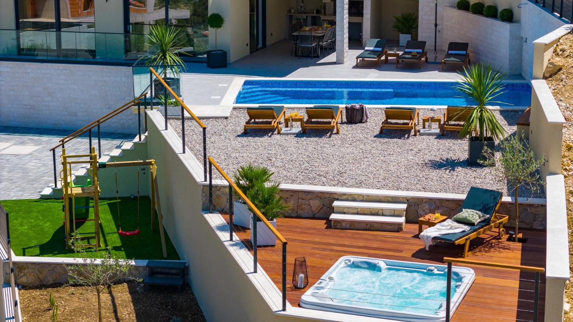 Casa Vita featuring a sea view, billiards, and heated pool view 2