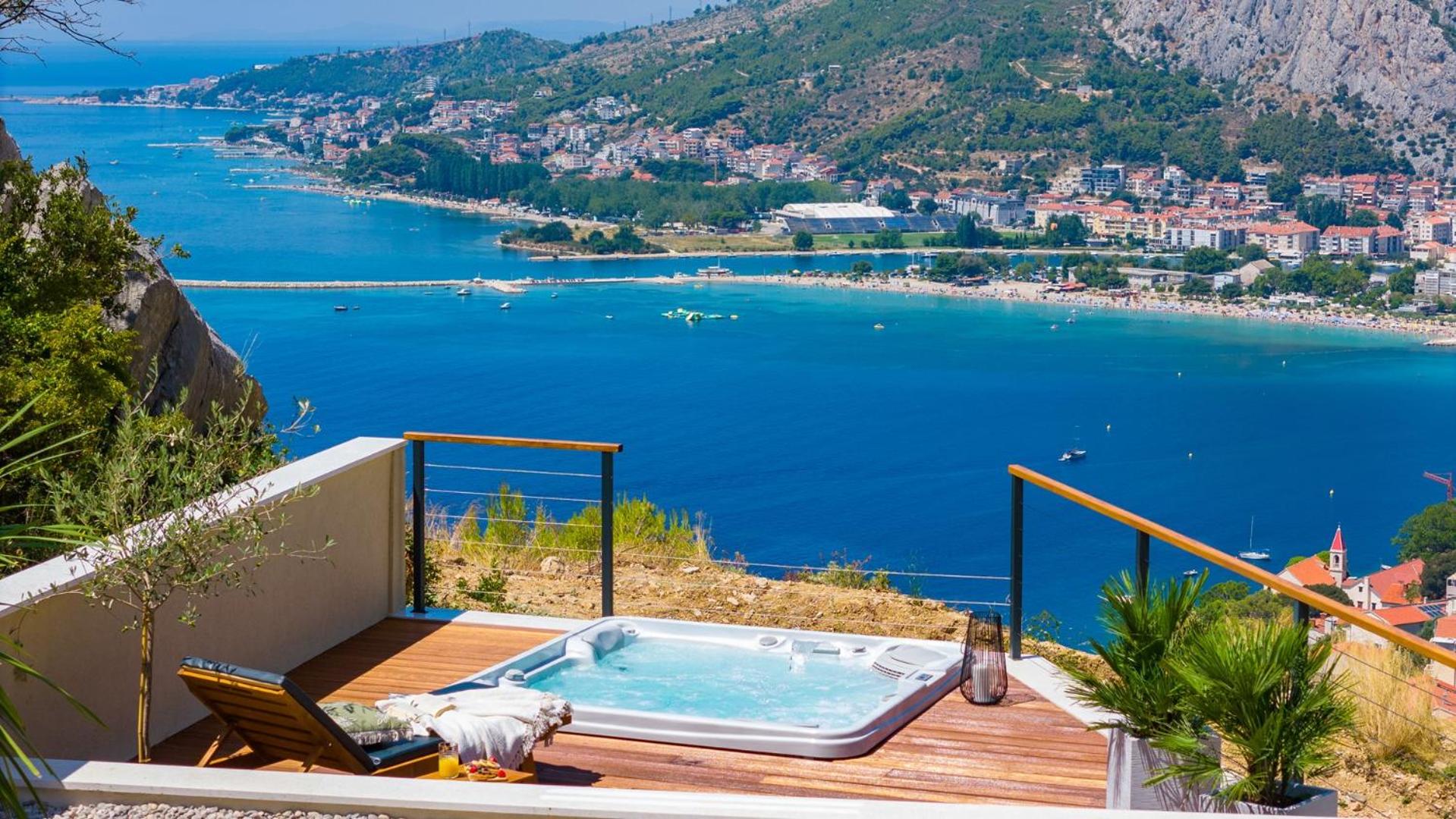 Casa Vita featuring a sea view, billiards, and heated pool view 5