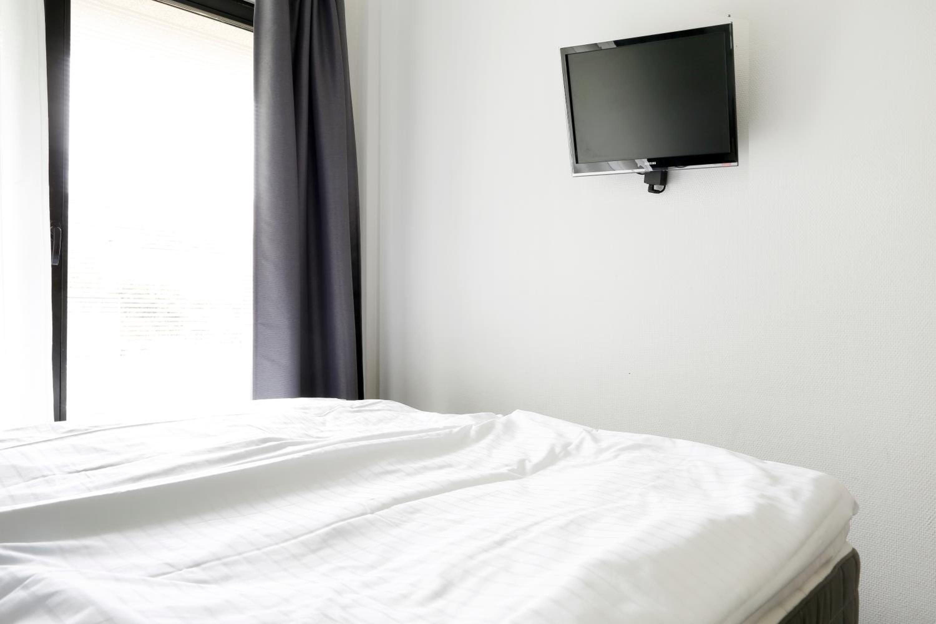 NIEB by ROCKCHAIR Apartments l SUPERHOST Status l 3 Bedrooms Boxspringbeds 3 Bathrooms in Center 