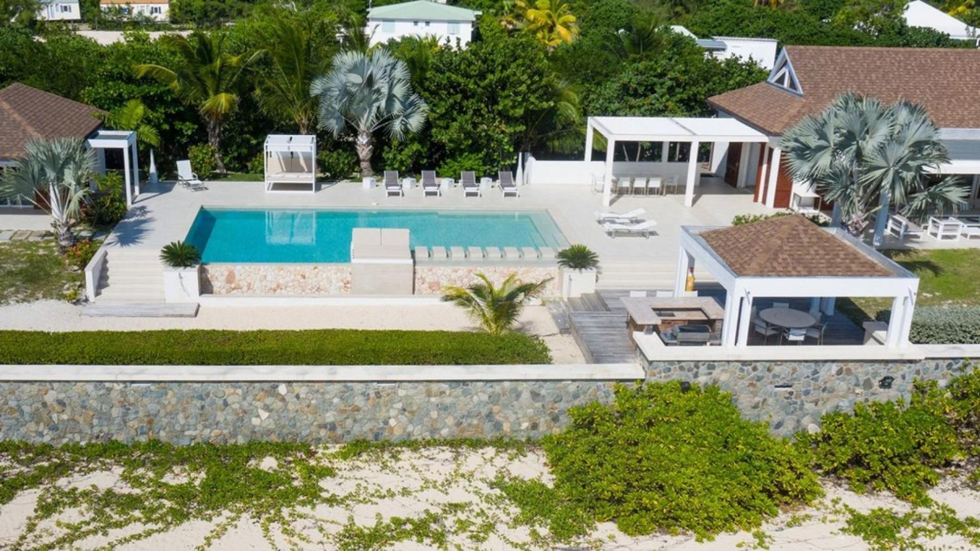 Deluxe 4BR beachfront villa with sunset views