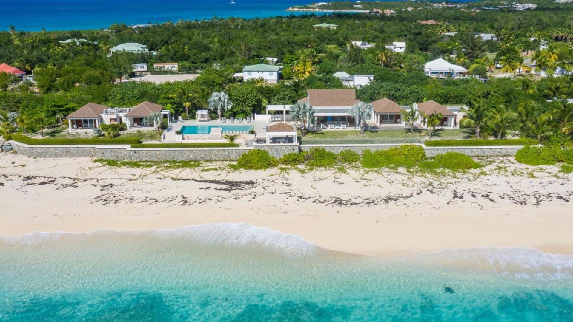 Deluxe 4BR beachfront villa with sunset views