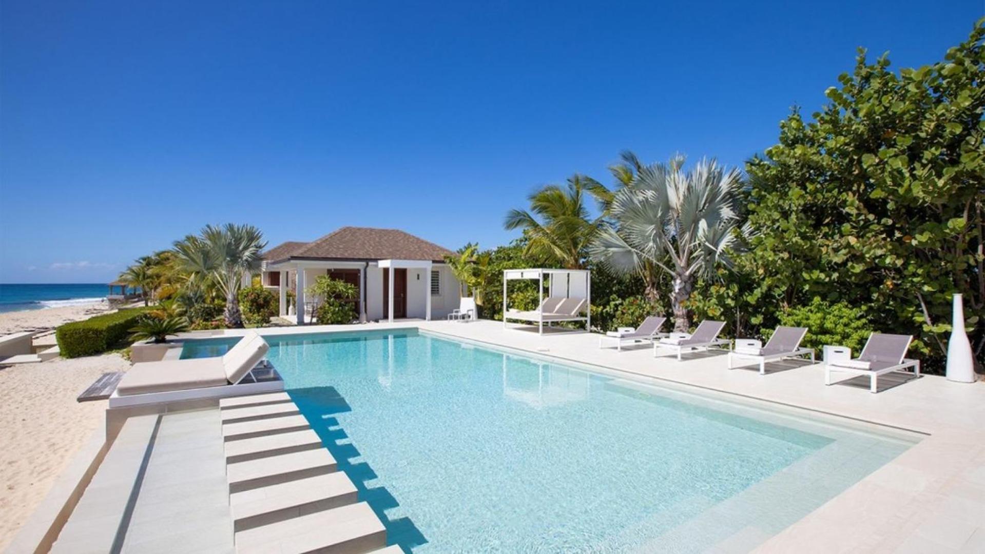 Deluxe 4BR beachfront villa with sunset views