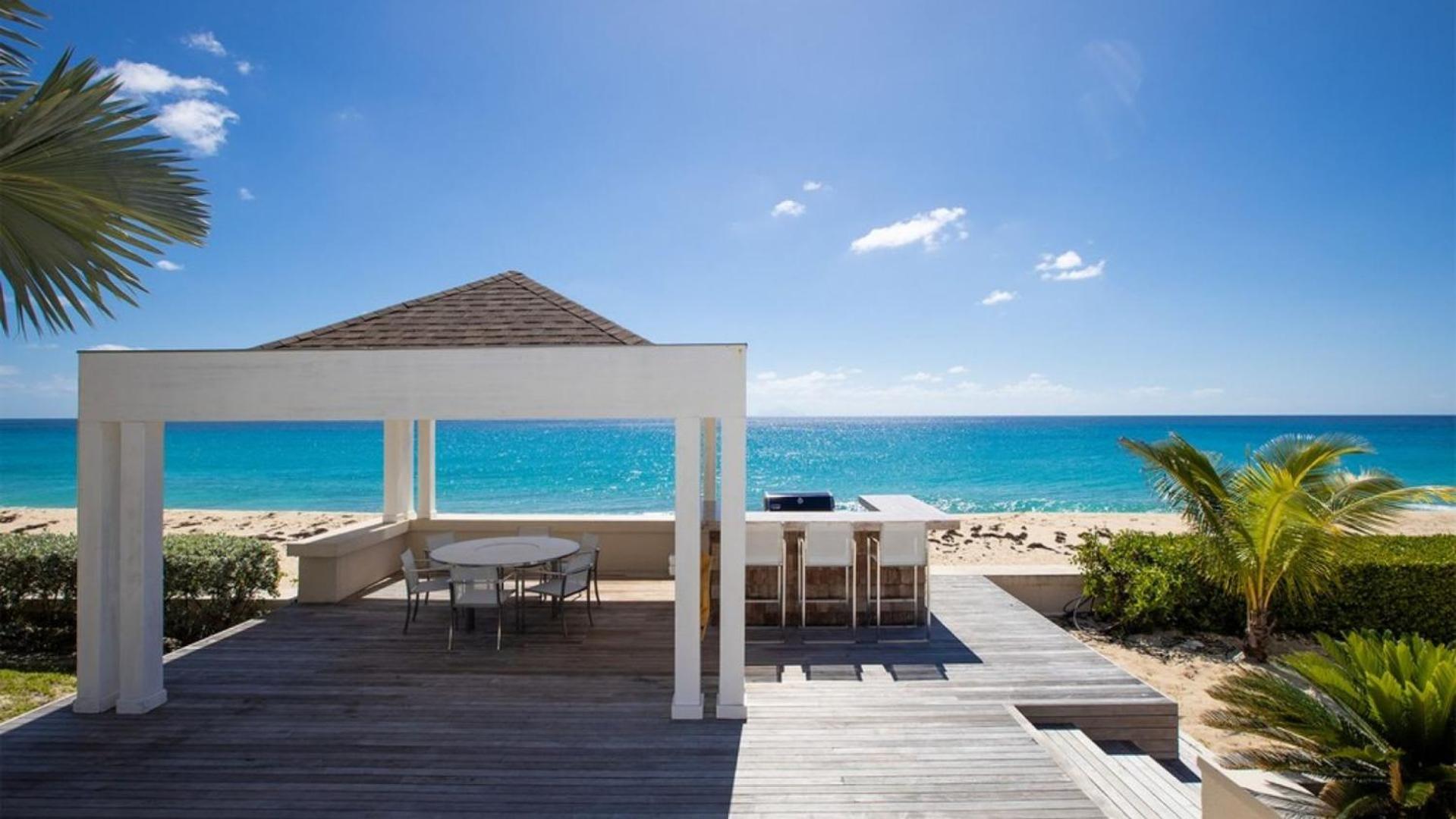 Deluxe 4BR beachfront villa with sunset views