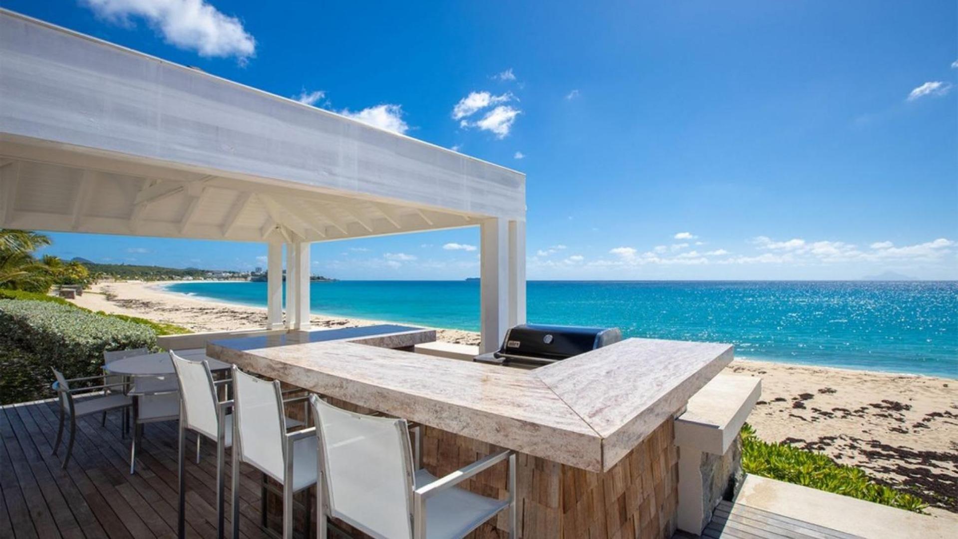 Deluxe 4BR beachfront villa with sunset views