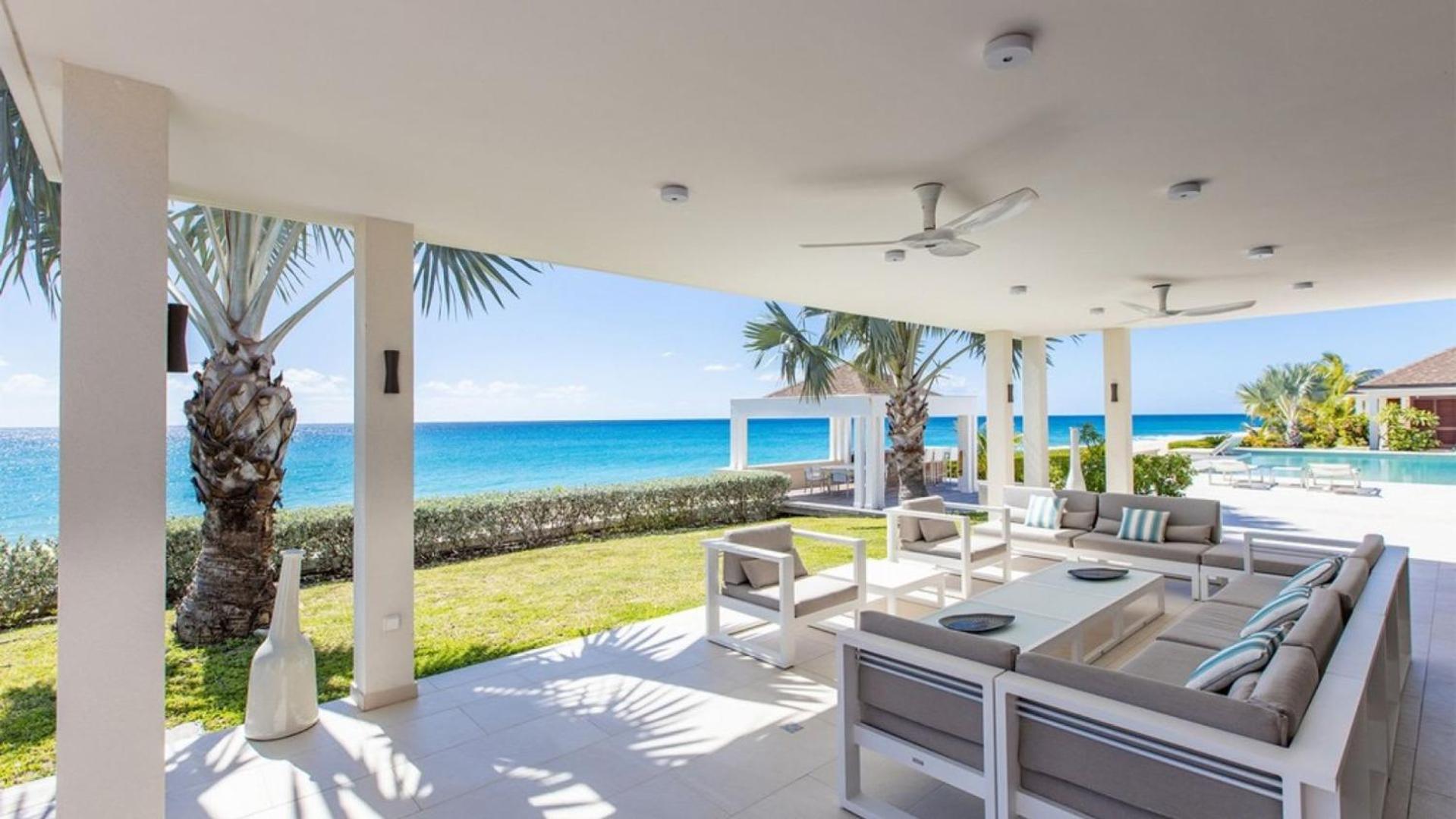 Deluxe 4BR beachfront villa with sunset views