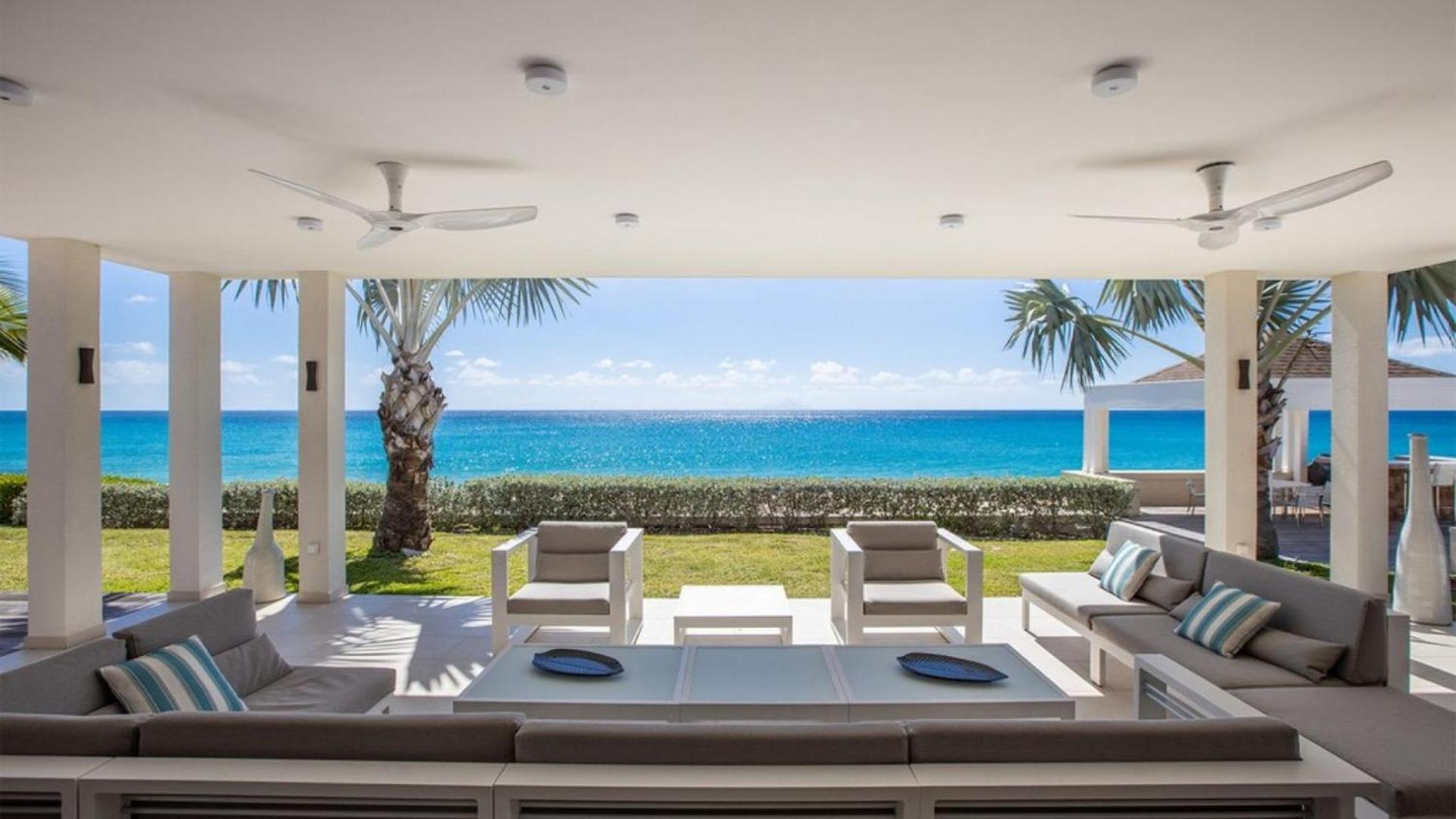Deluxe 4BR beachfront villa with sunset views