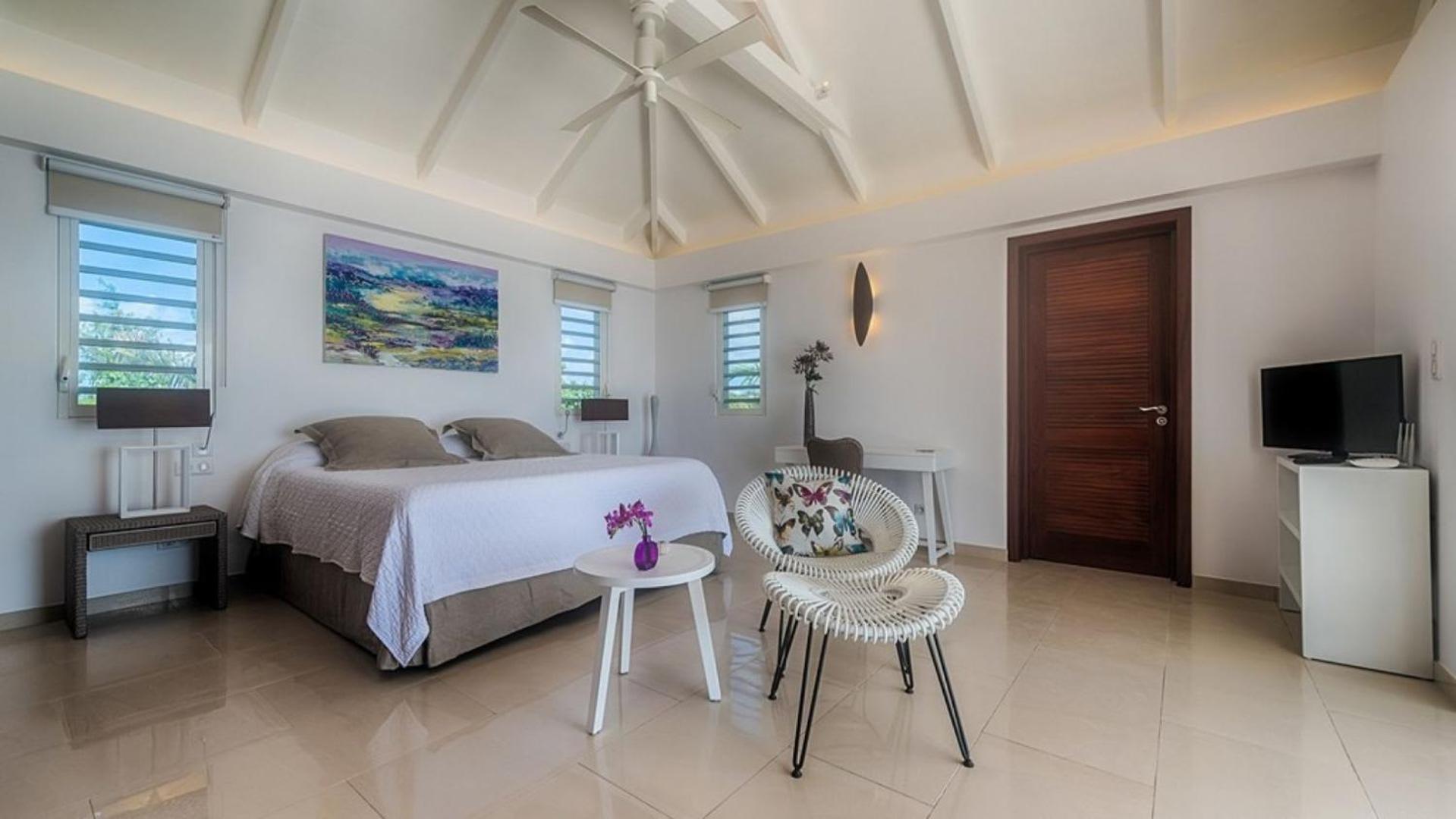 Deluxe 4BR beachfront villa with sunset views