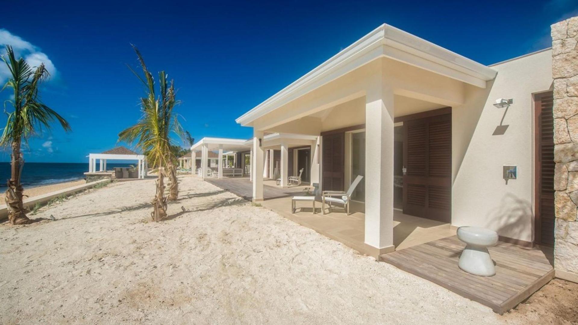 Deluxe 4BR beachfront villa with sunset views