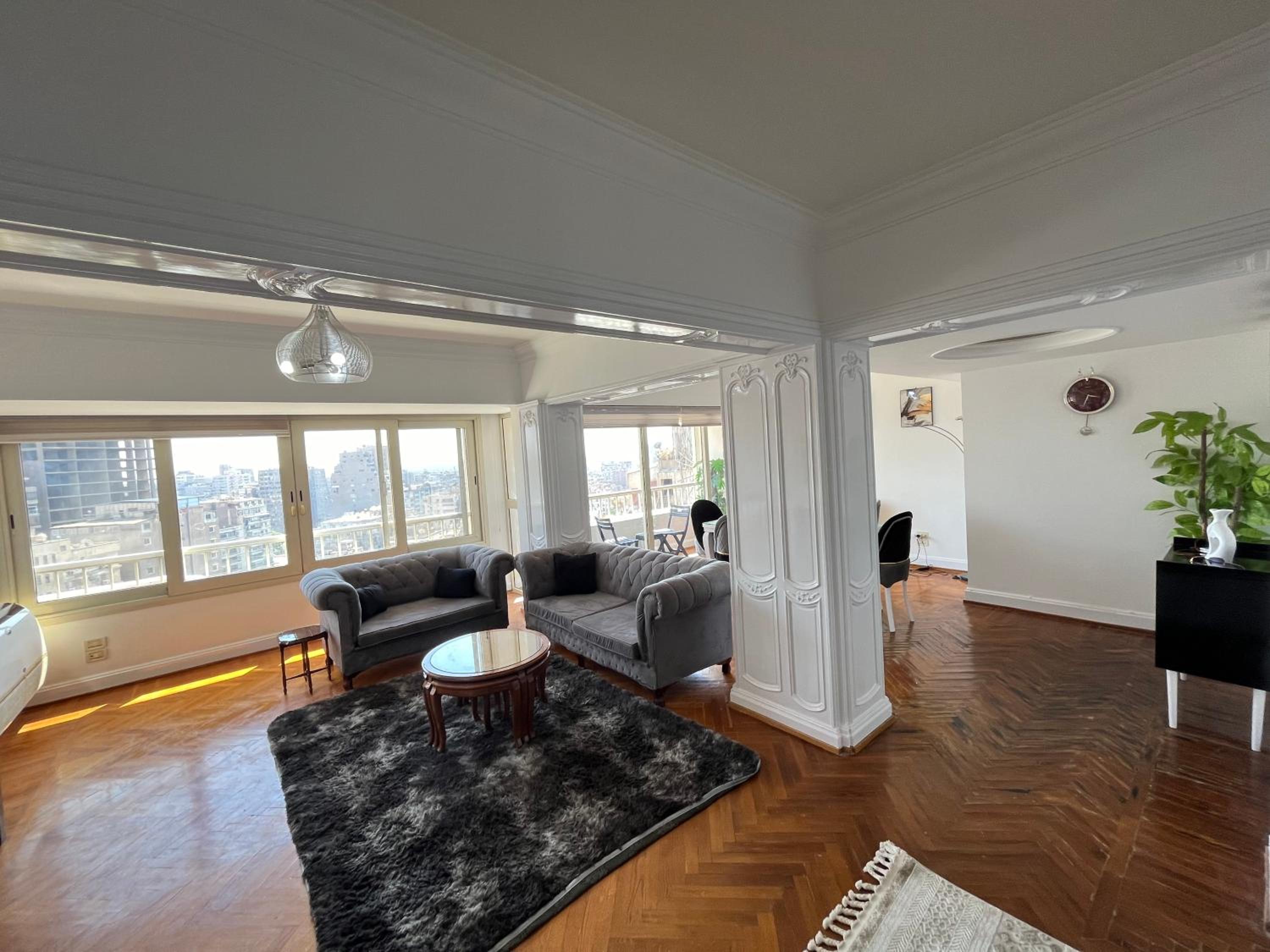Skyscraper apartment with Nile & Pyramids view