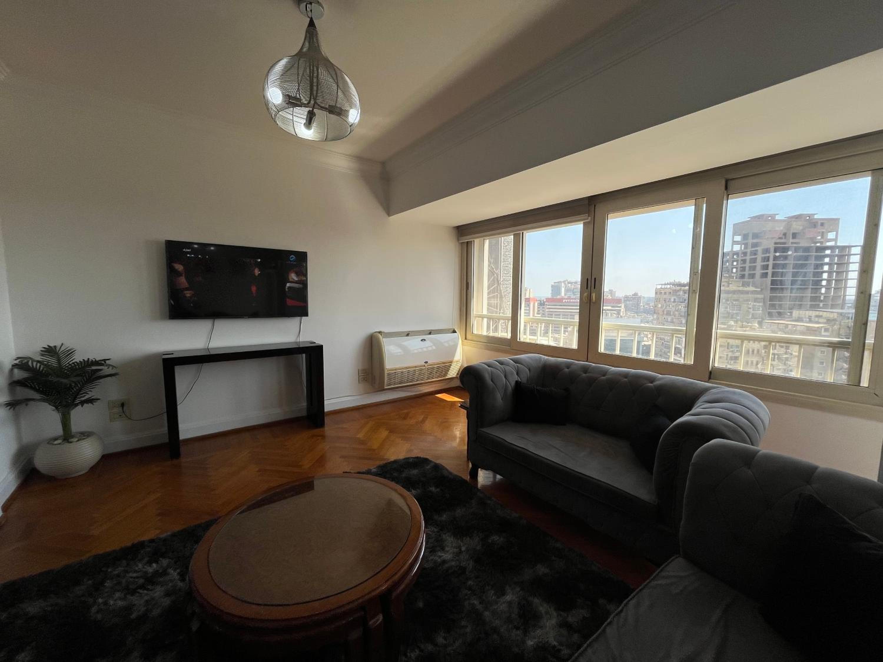 Skyscraper apartment with Nile & Pyramids view