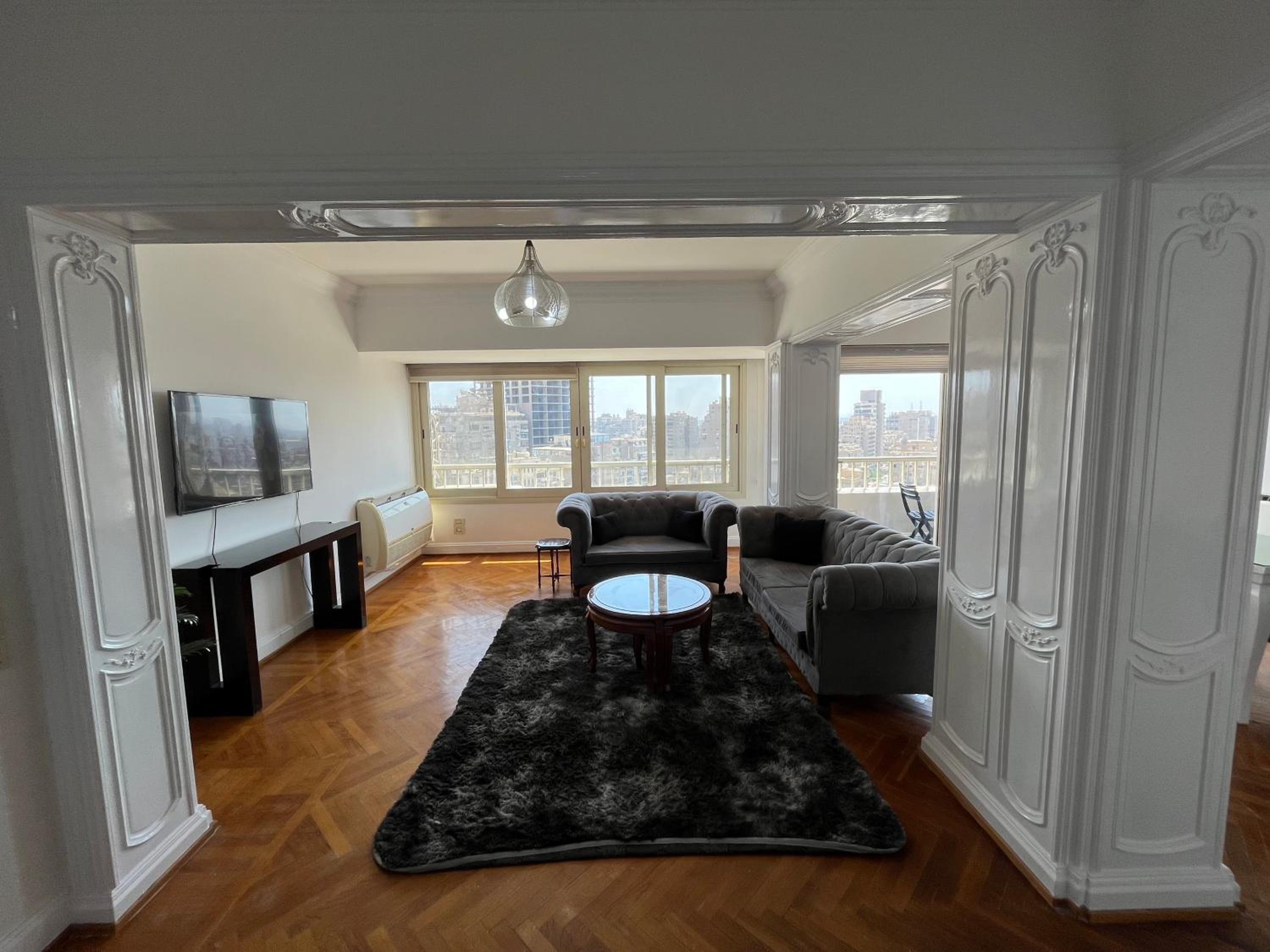 Skyscraper apartment with Nile & Pyramids view