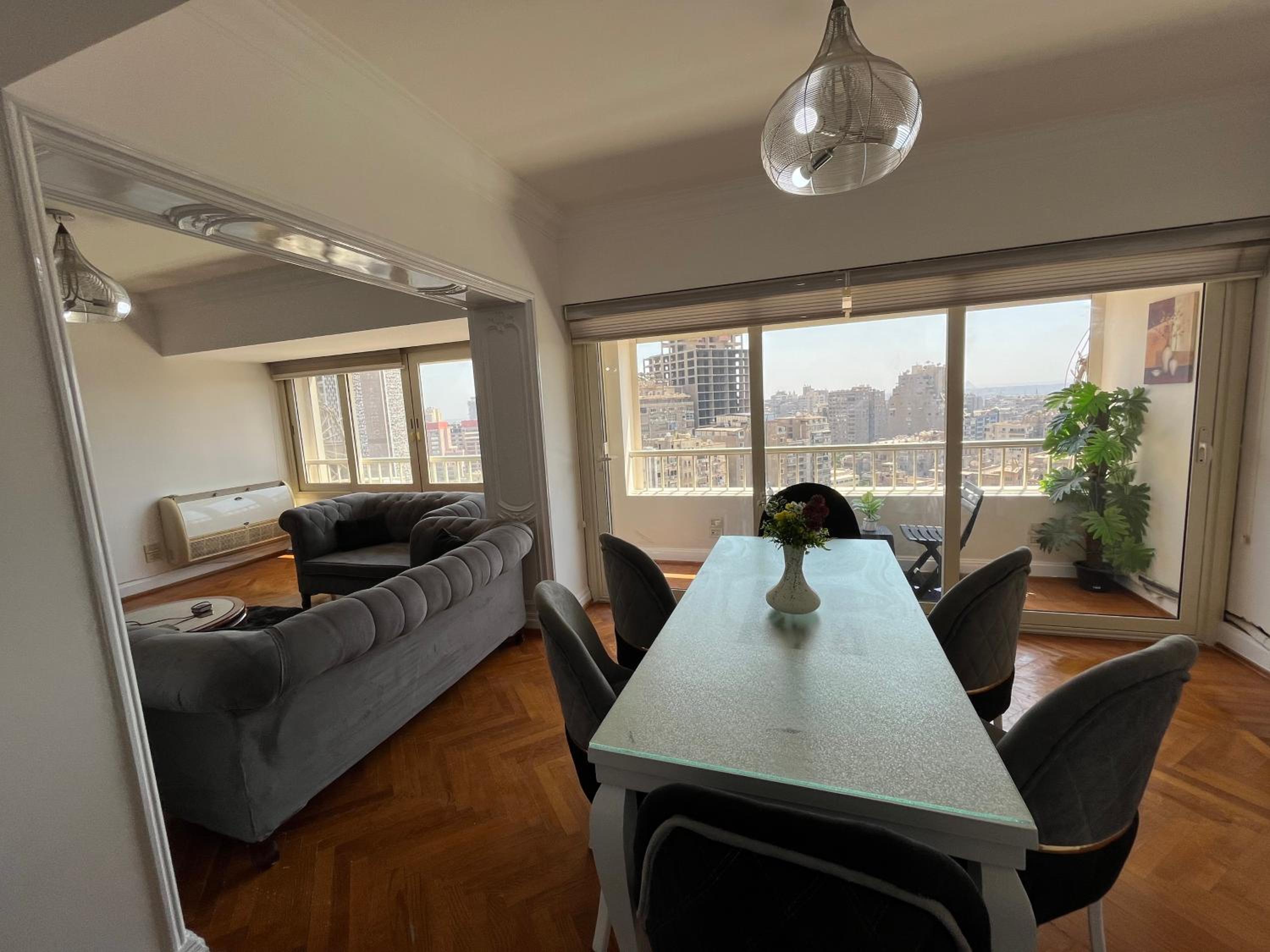 Skyscraper apartment with Nile & Pyramids view