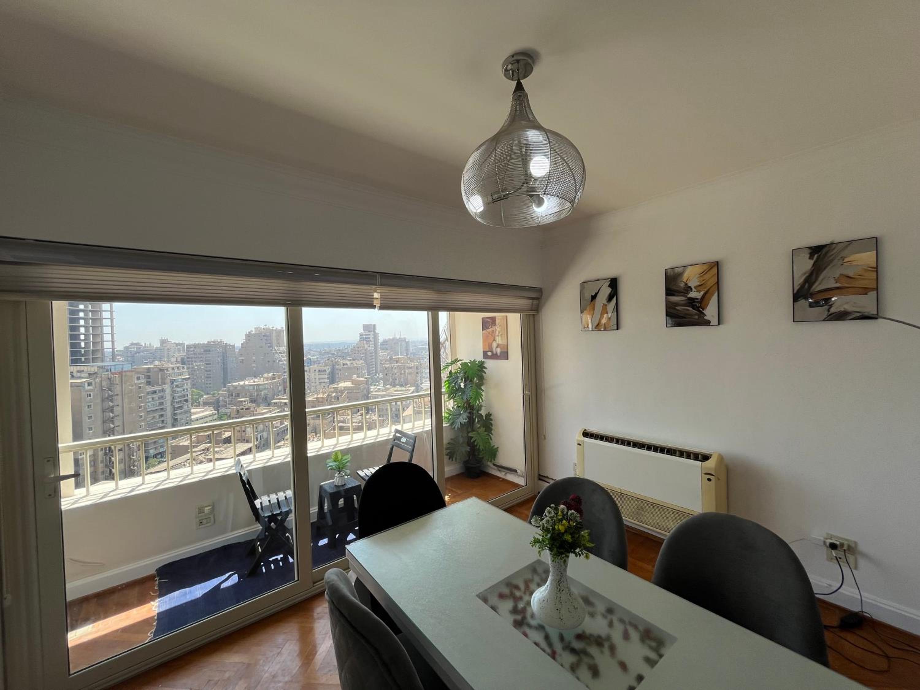 Skyscraper apartment with Nile & Pyramids view