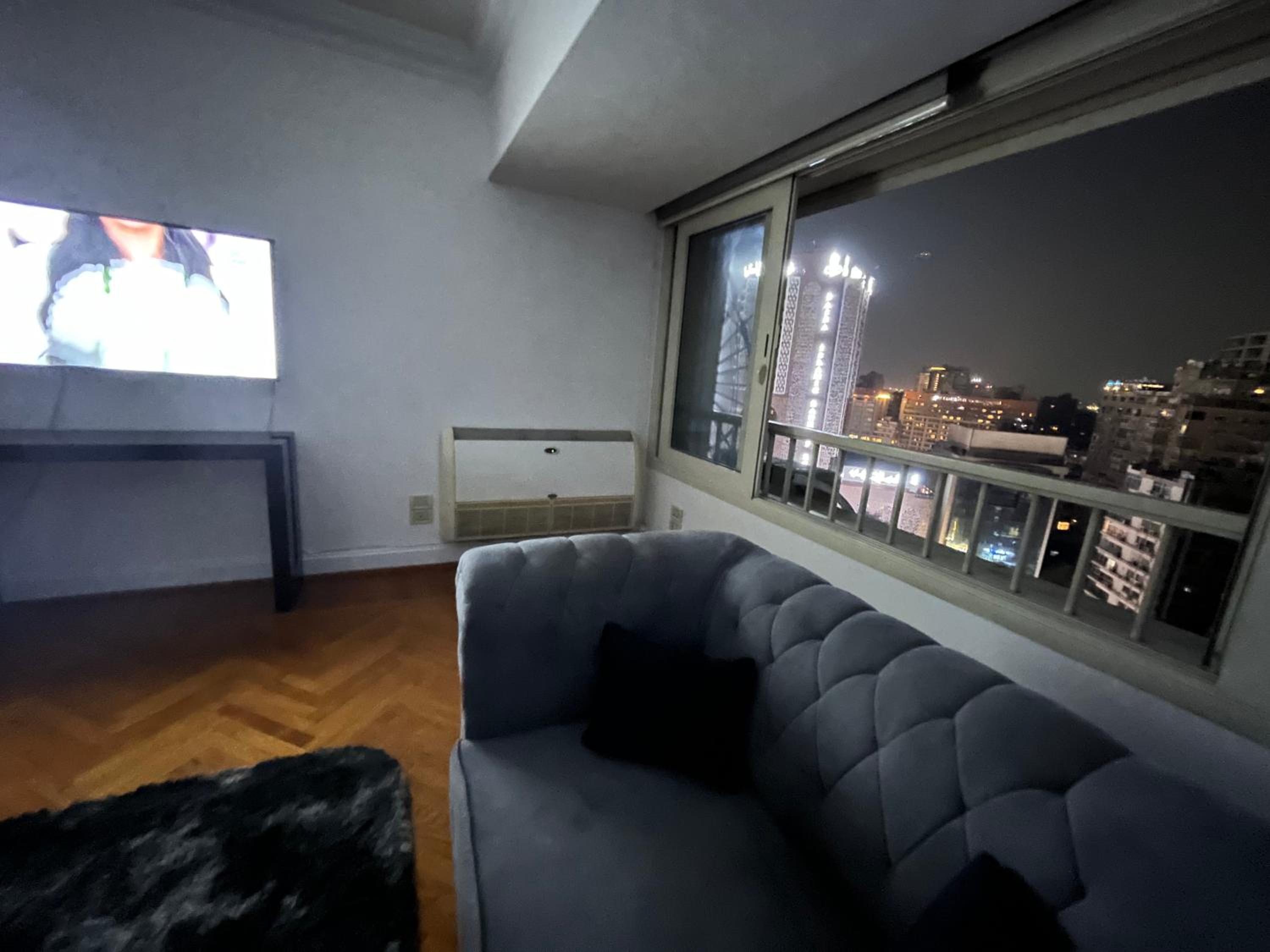 Skyscraper apartment with Nile & Pyramids view