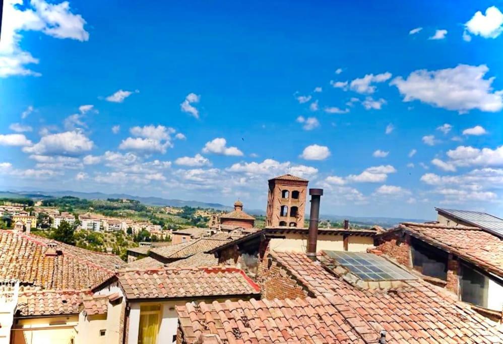 Dimora con finestra sui tetti di Siena