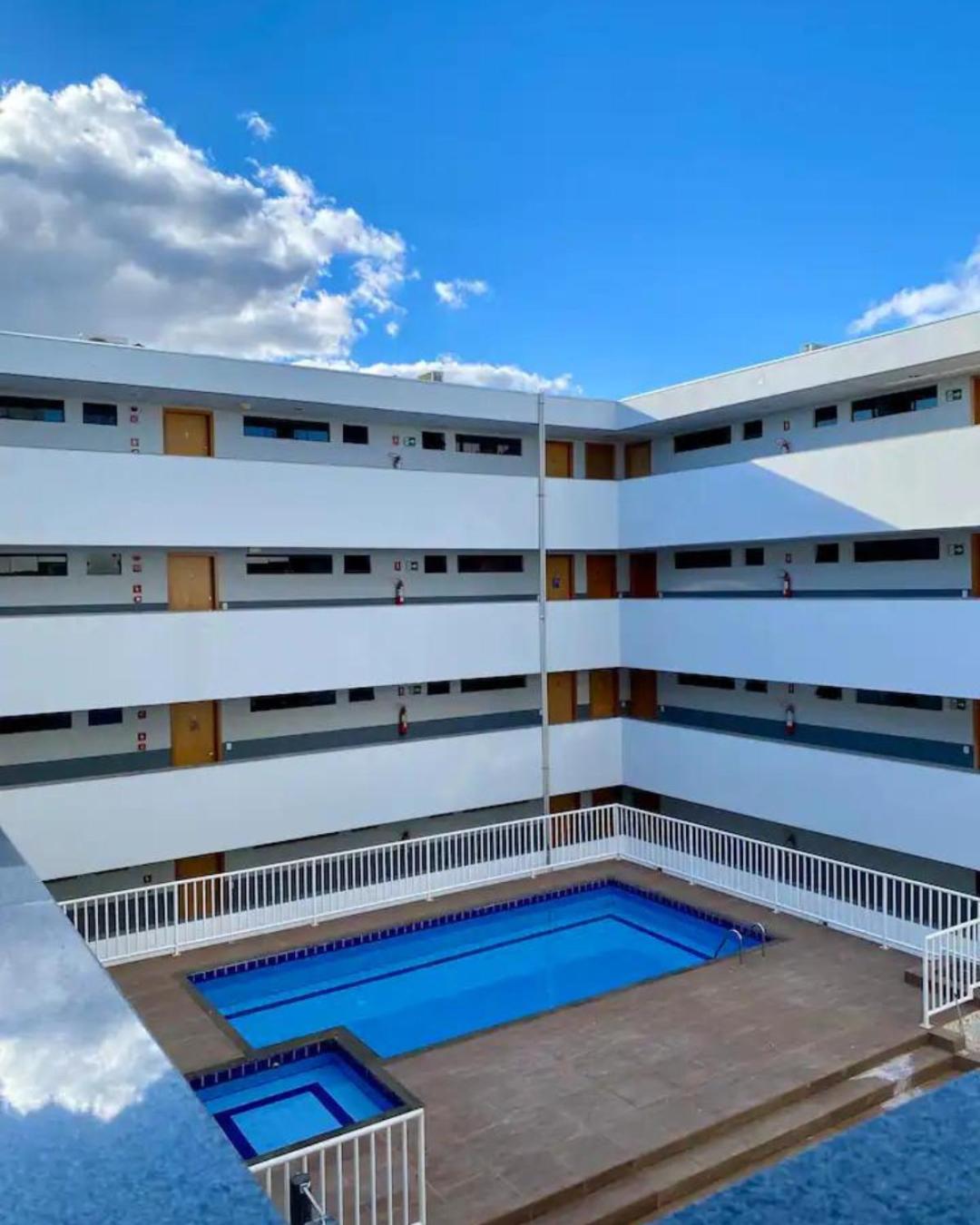 Flat Lago Norte com Vista Livre Nascente - Condomínio Piscina, Estaciomento e Portaria 24h - Cozinha Completa e Wi-Fi 400mbps