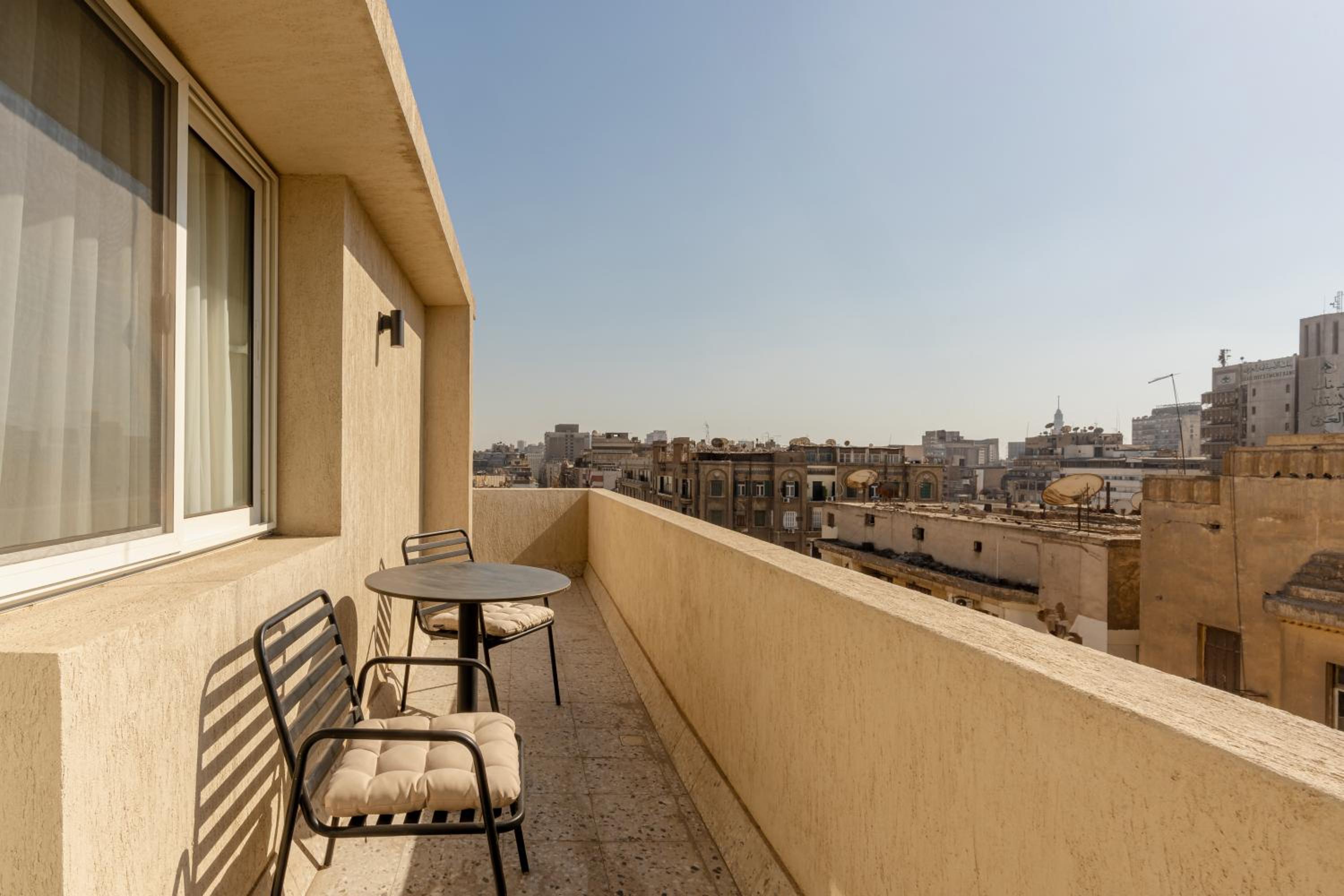 grey l studio apartments Downtown Cairo Ouzonian House