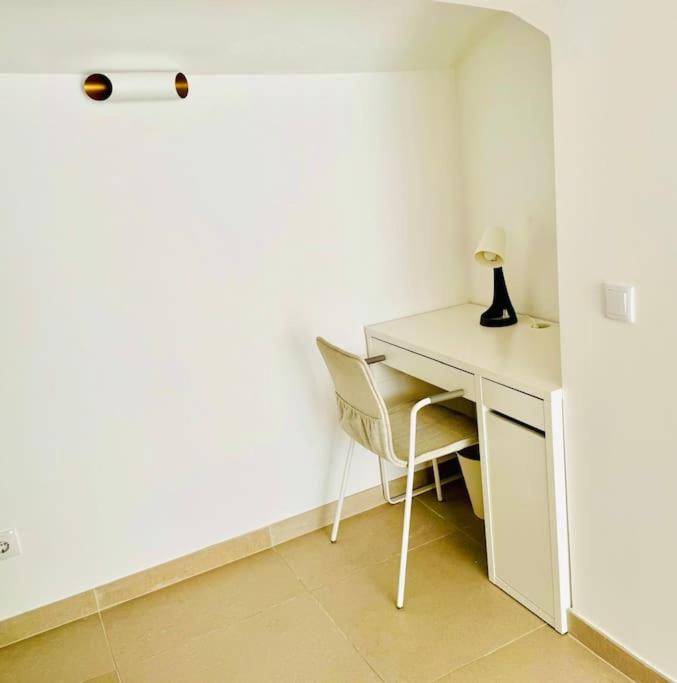 Renovated Apartment with Small Garden in Ajuda view 4