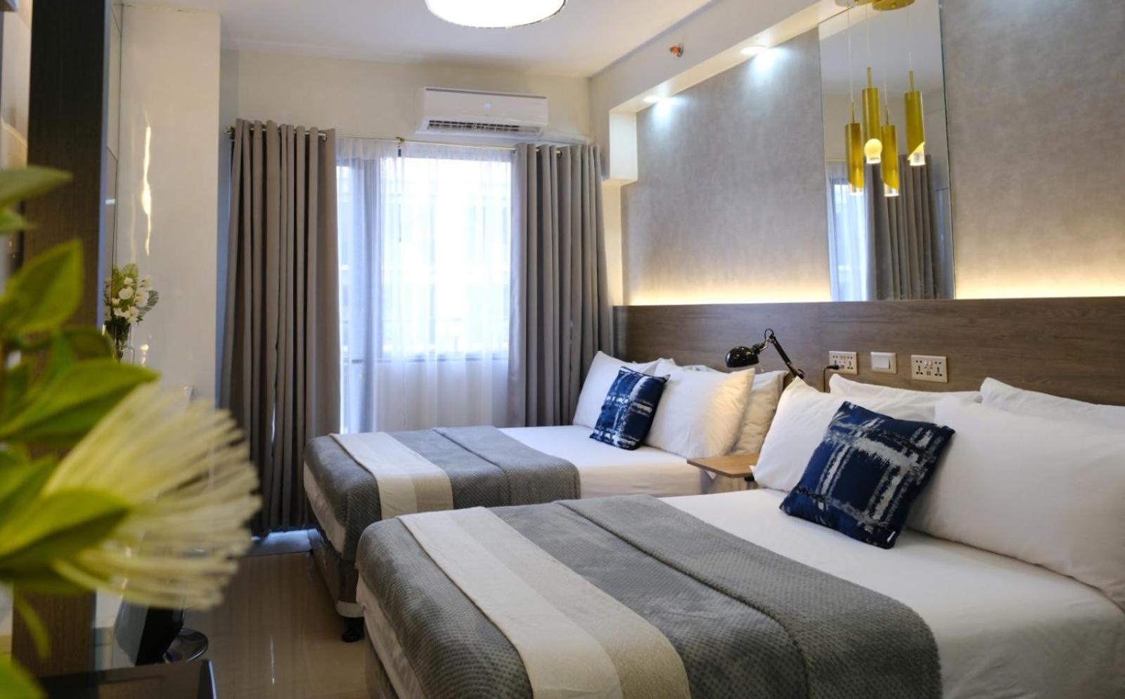 Stylish Studio Condotel with 2 Beds near Mall of Asia & Airport - JWL Suites