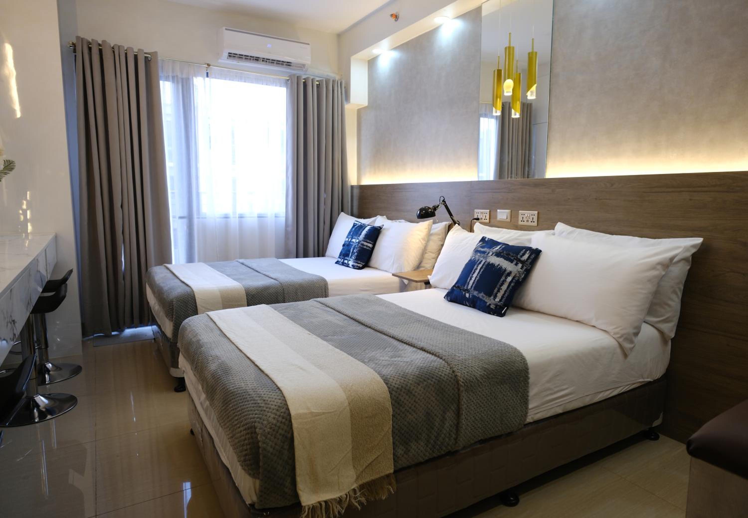 Stylish Studio Condotel with 2 Beds near Mall of Asia & Airport - JWL Suites