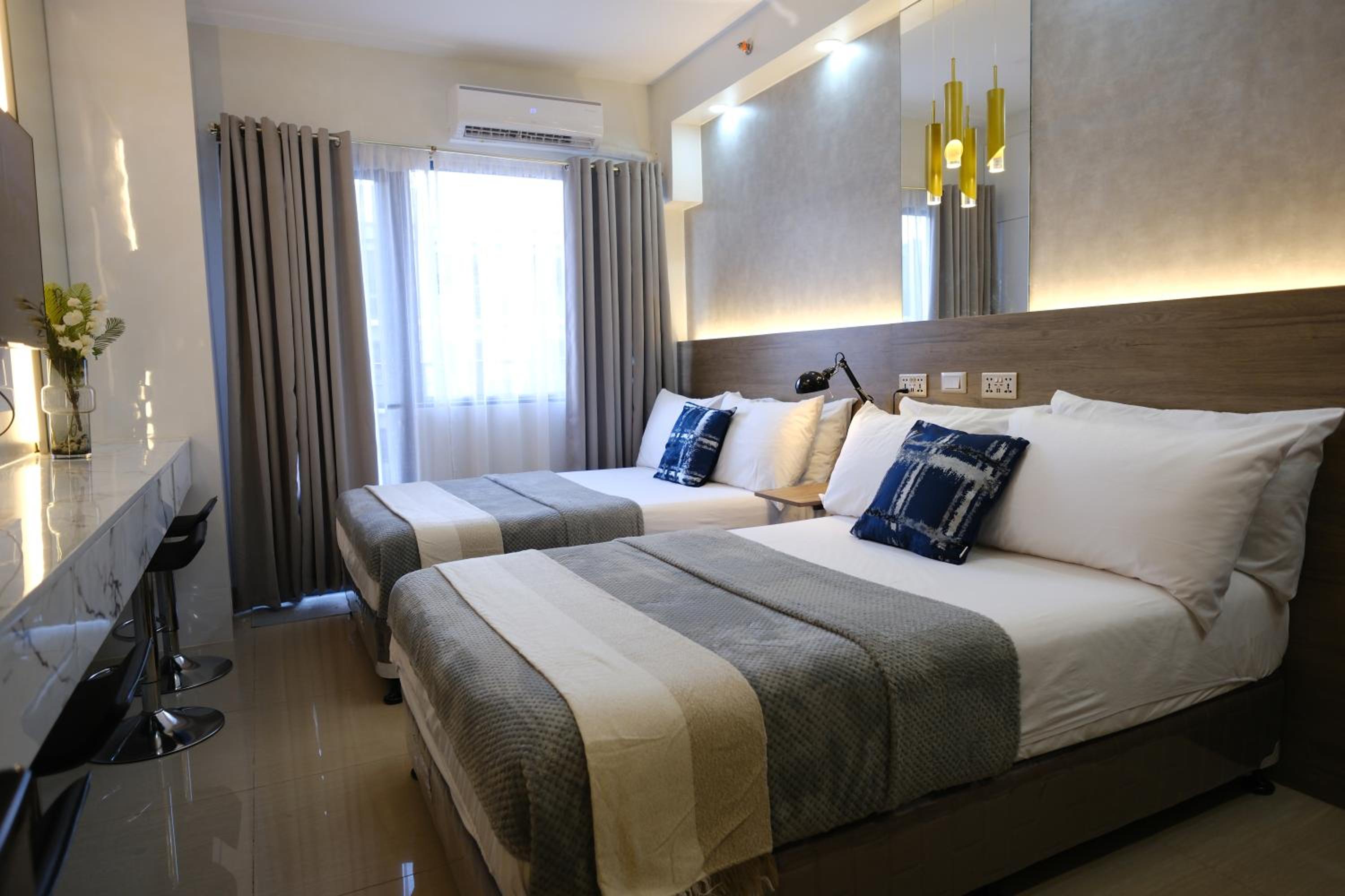 Stylish Studio Condotel with 2 Beds near Mall of Asia & Airport - JWL Suites photo 2