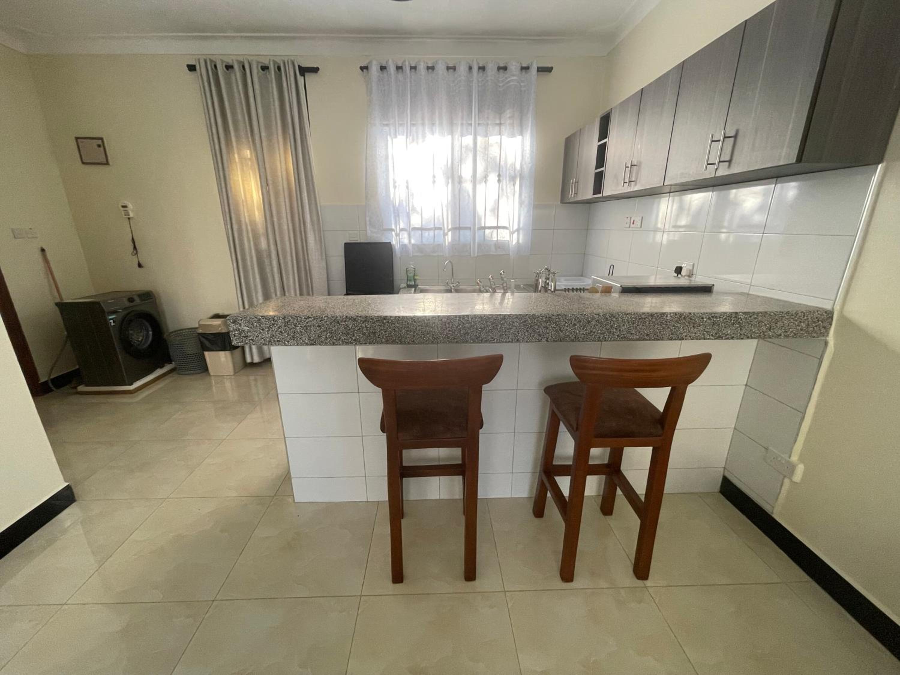 Cozy Home in Entebbe view 4