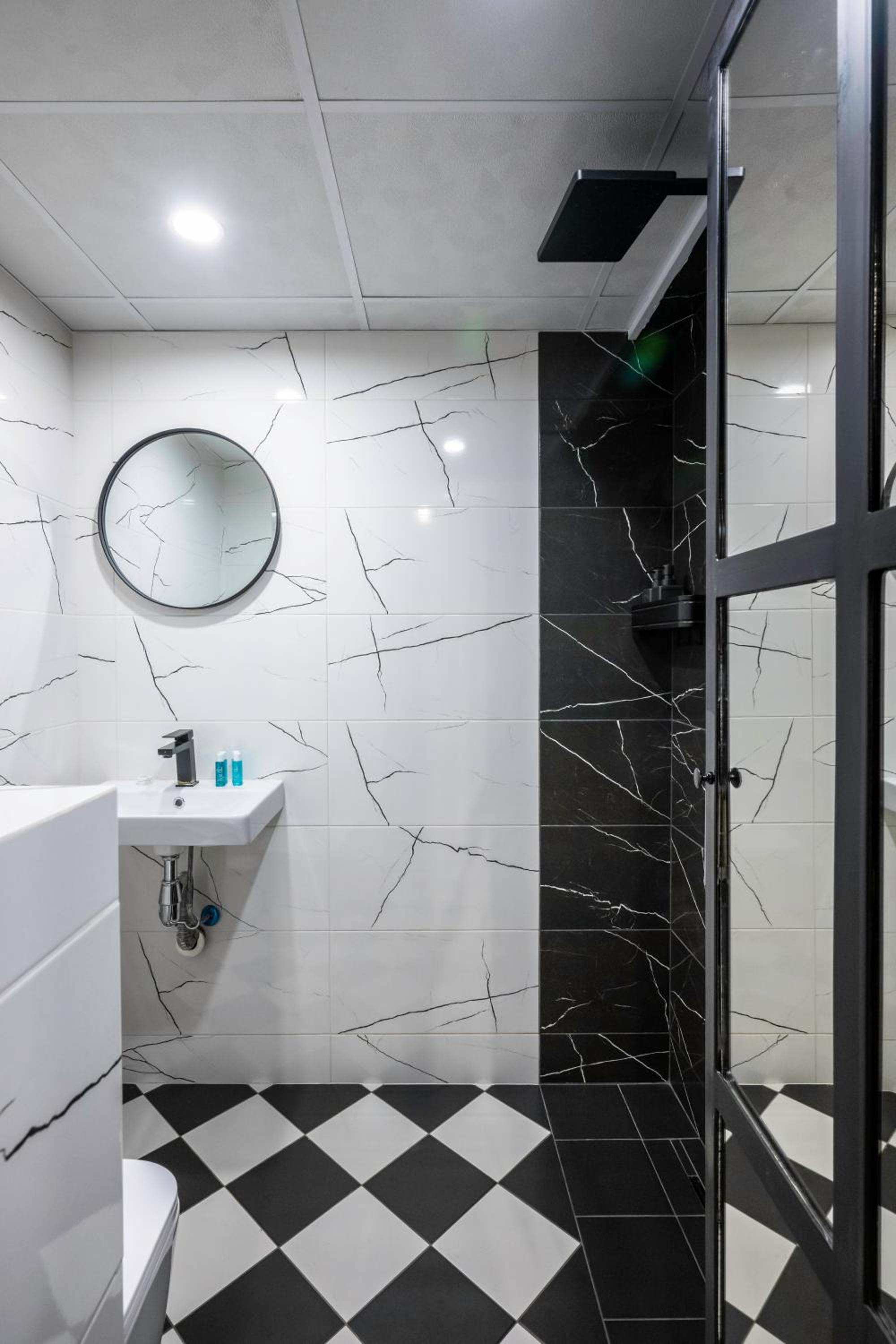 Central Art-Inspired Flat with Private Garage