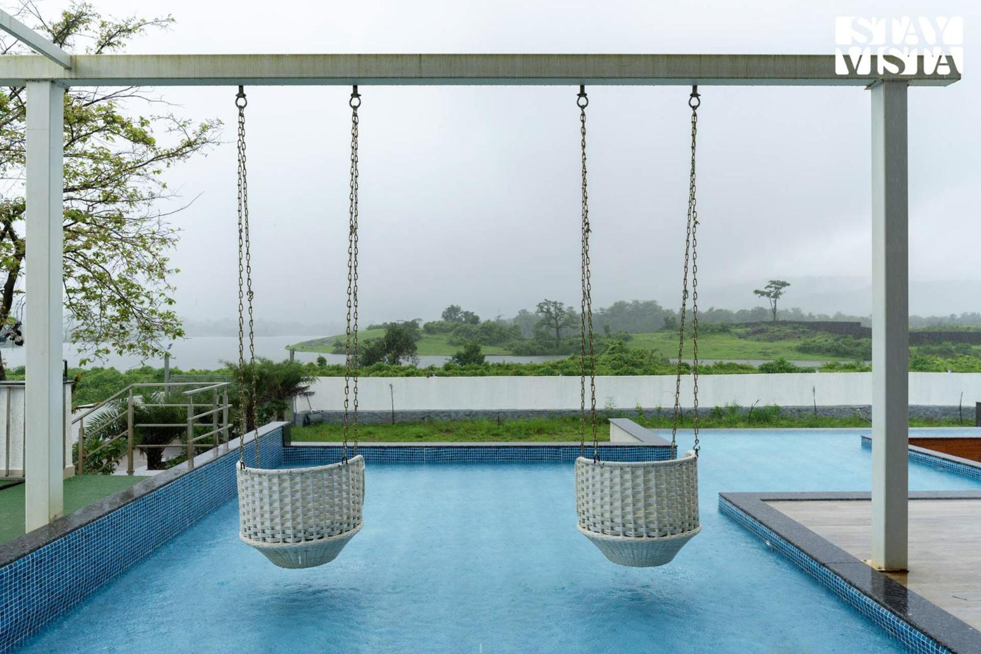 StayVista at Nilaya By The Lake with Infinity Pool view 5